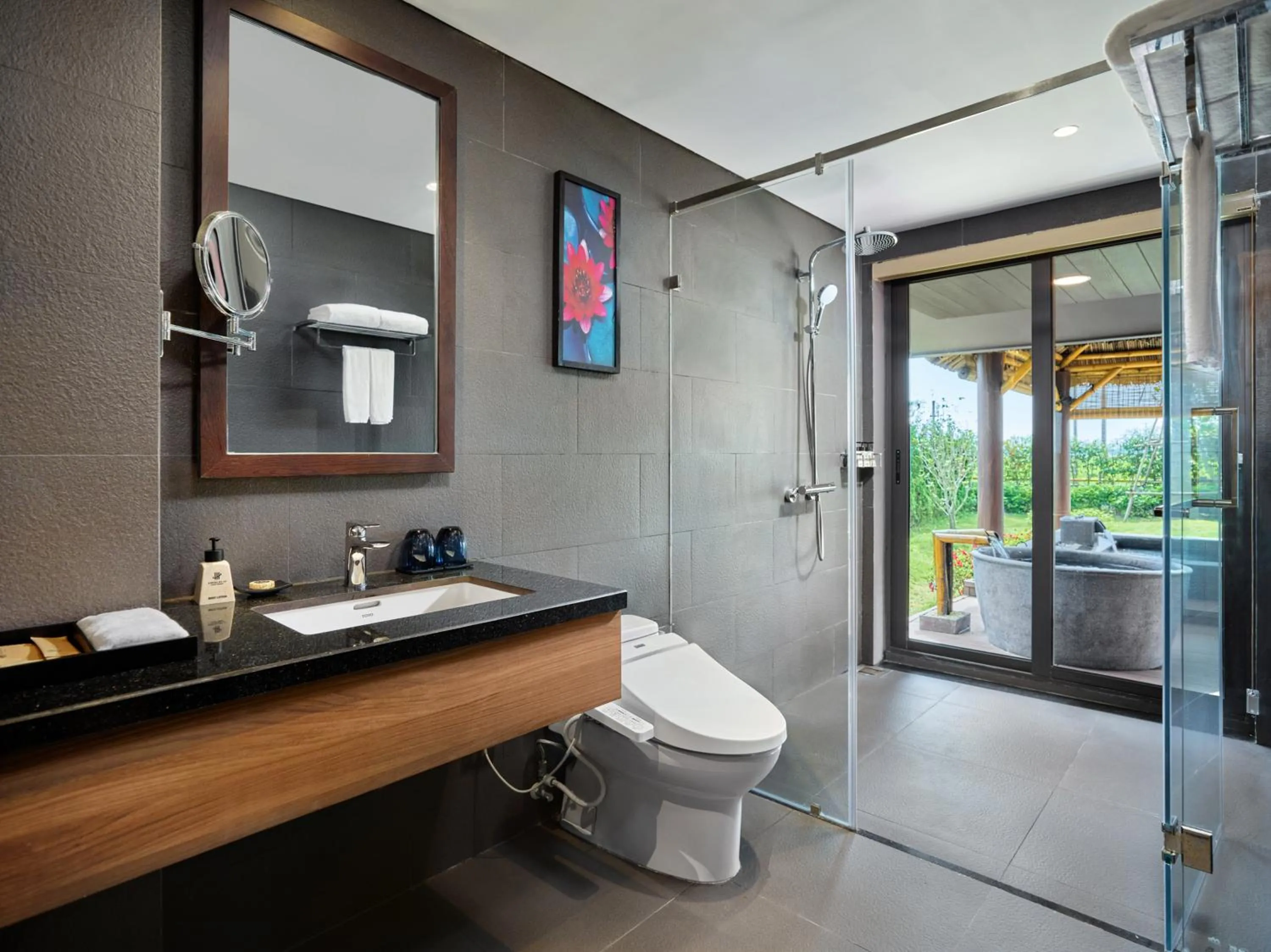 Shower in Kobi Onsen Resort Hue, Affiliated by Melia