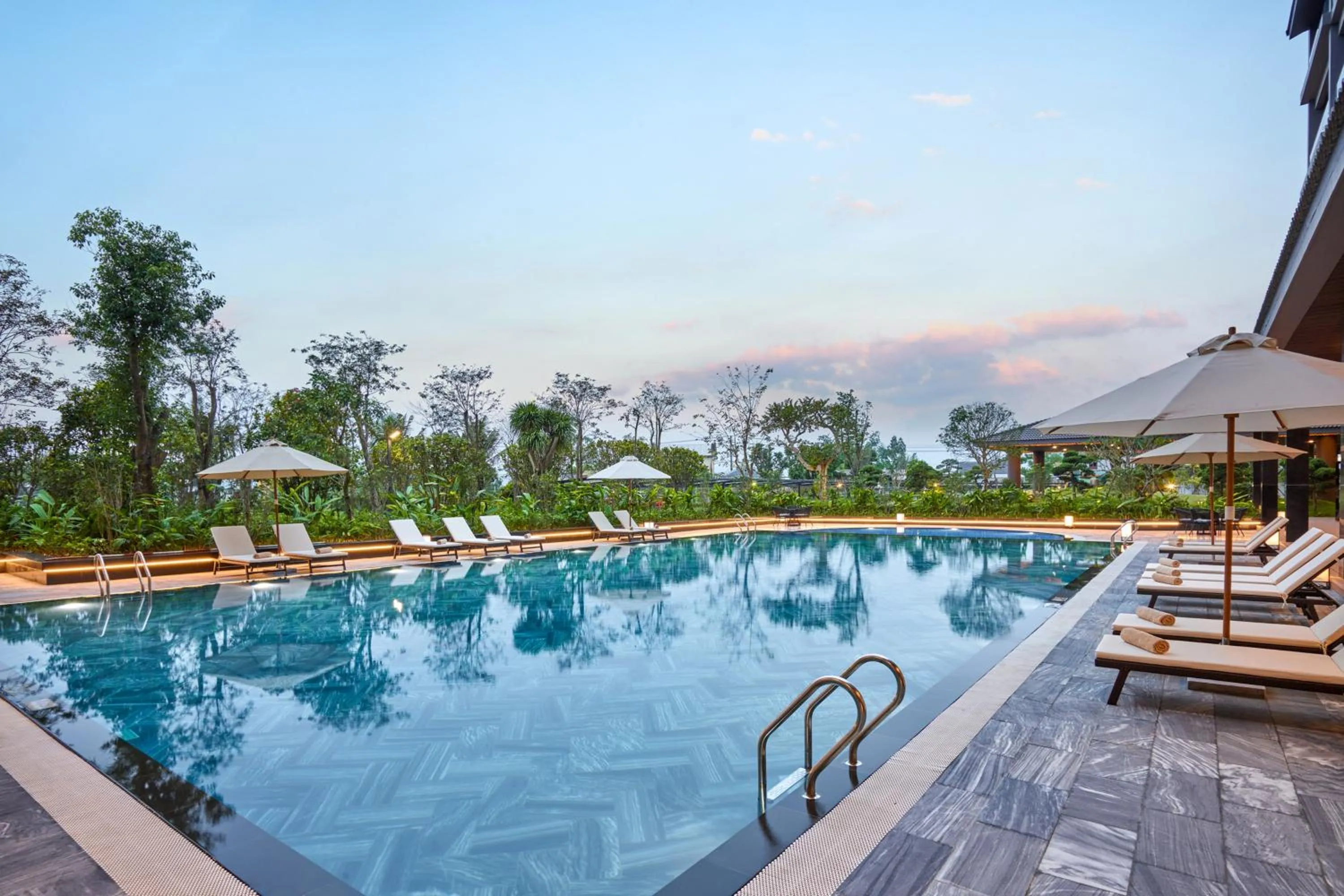 Swimming pool in Kobi Onsen Resort Hue, Affiliated by Melia