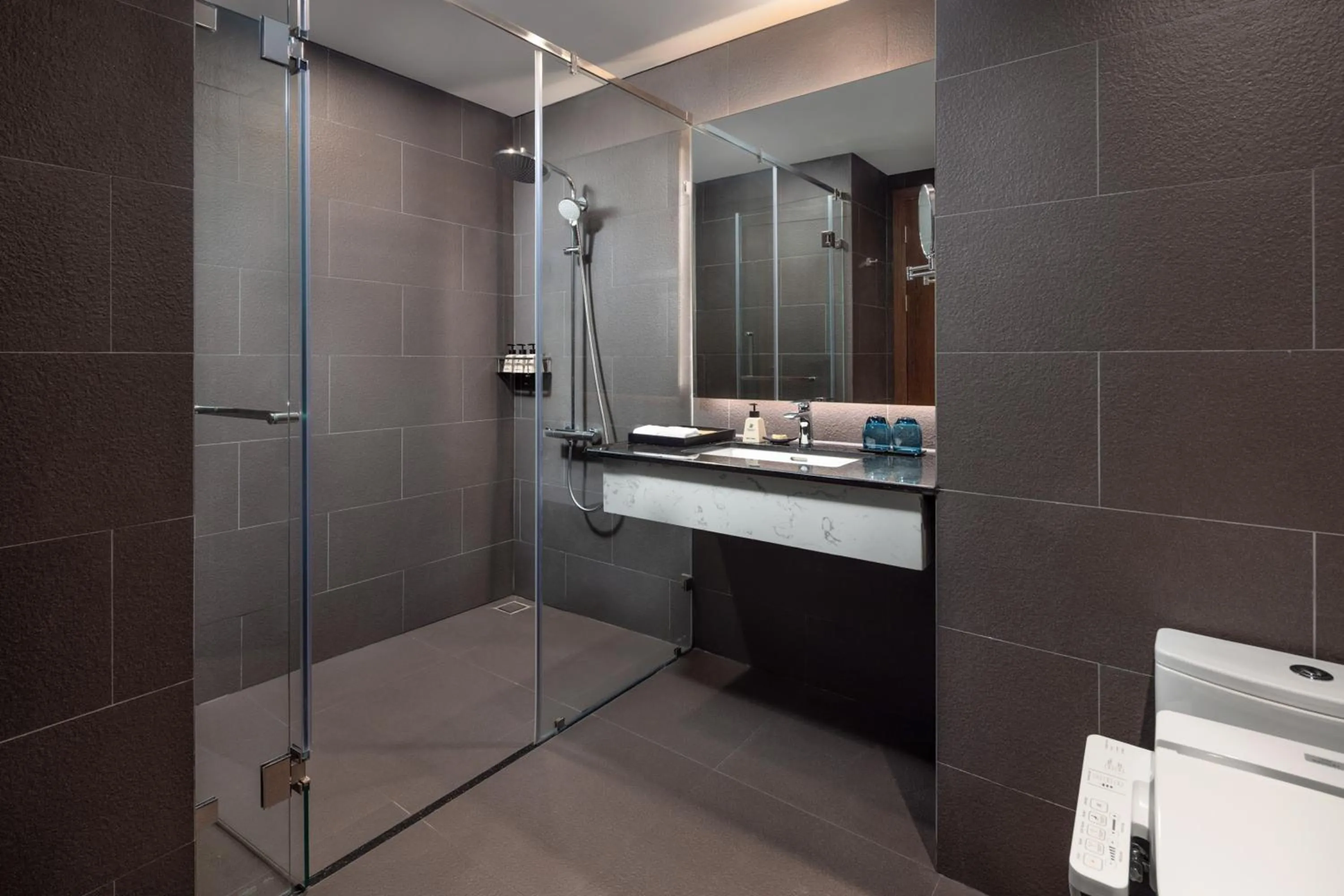 Shower in Kobi Onsen Resort Hue, Affiliated by Melia