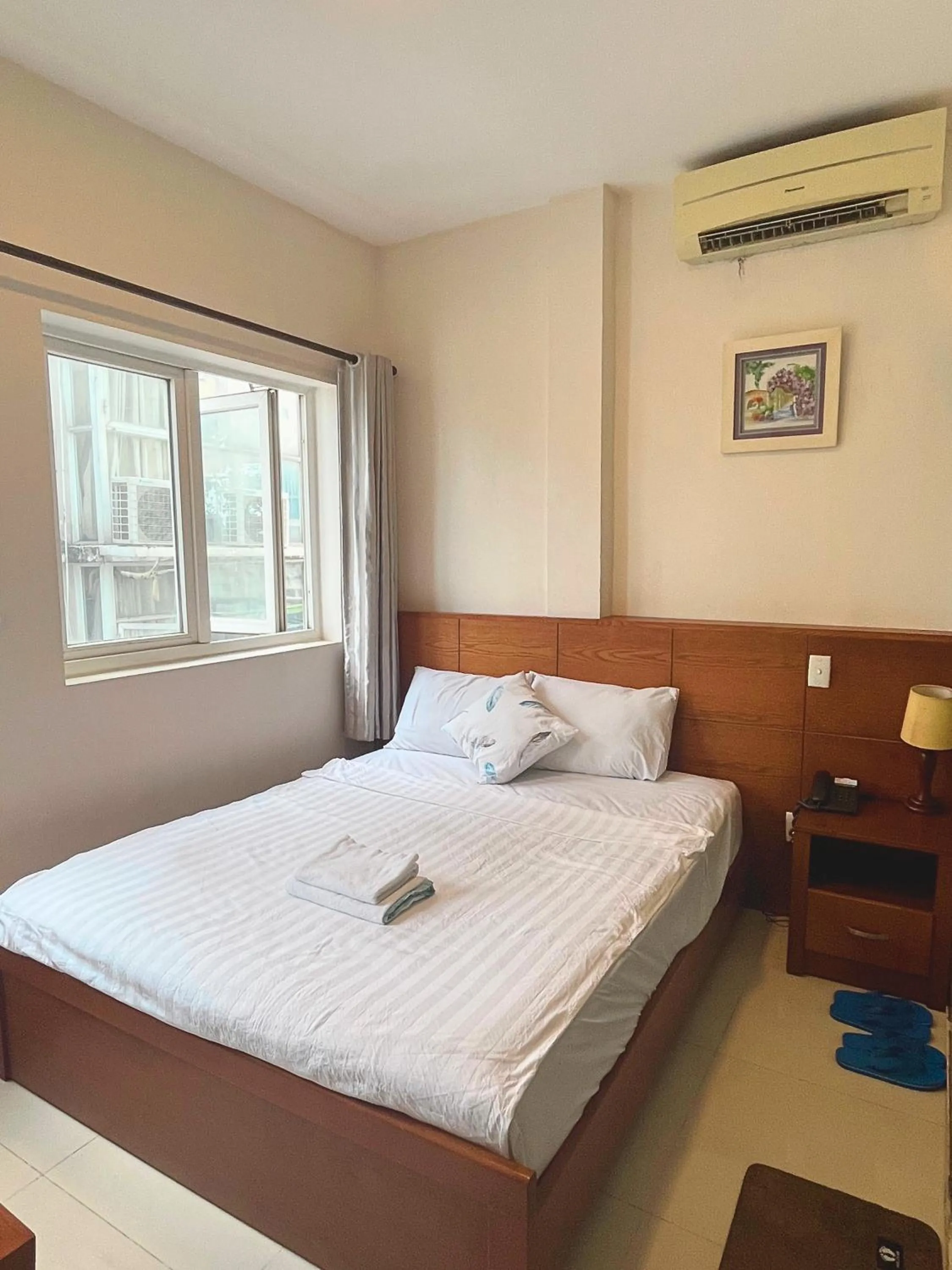 Bed in The Alley Saigon Hotel