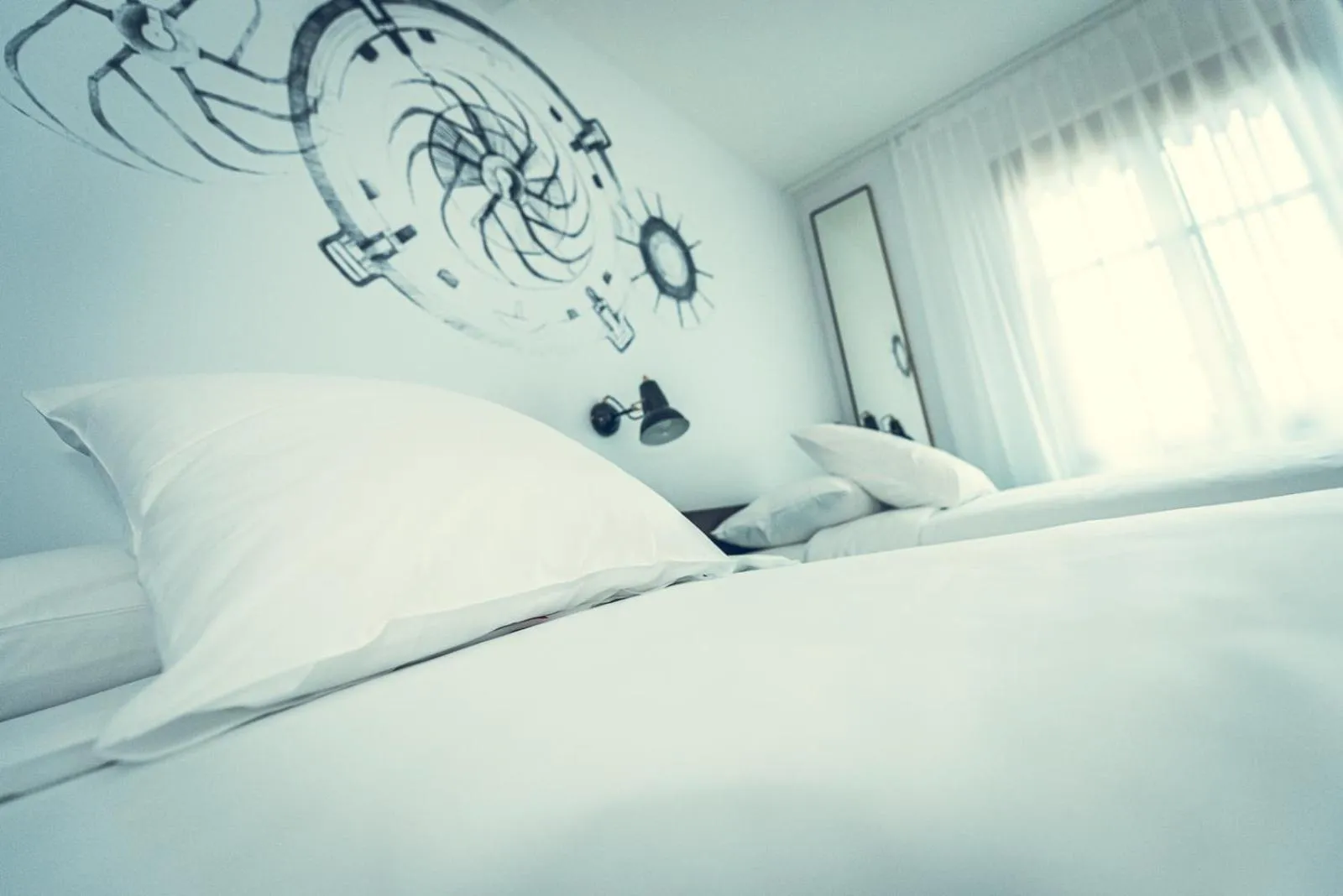 Bed in Hotel Bernina Geneva