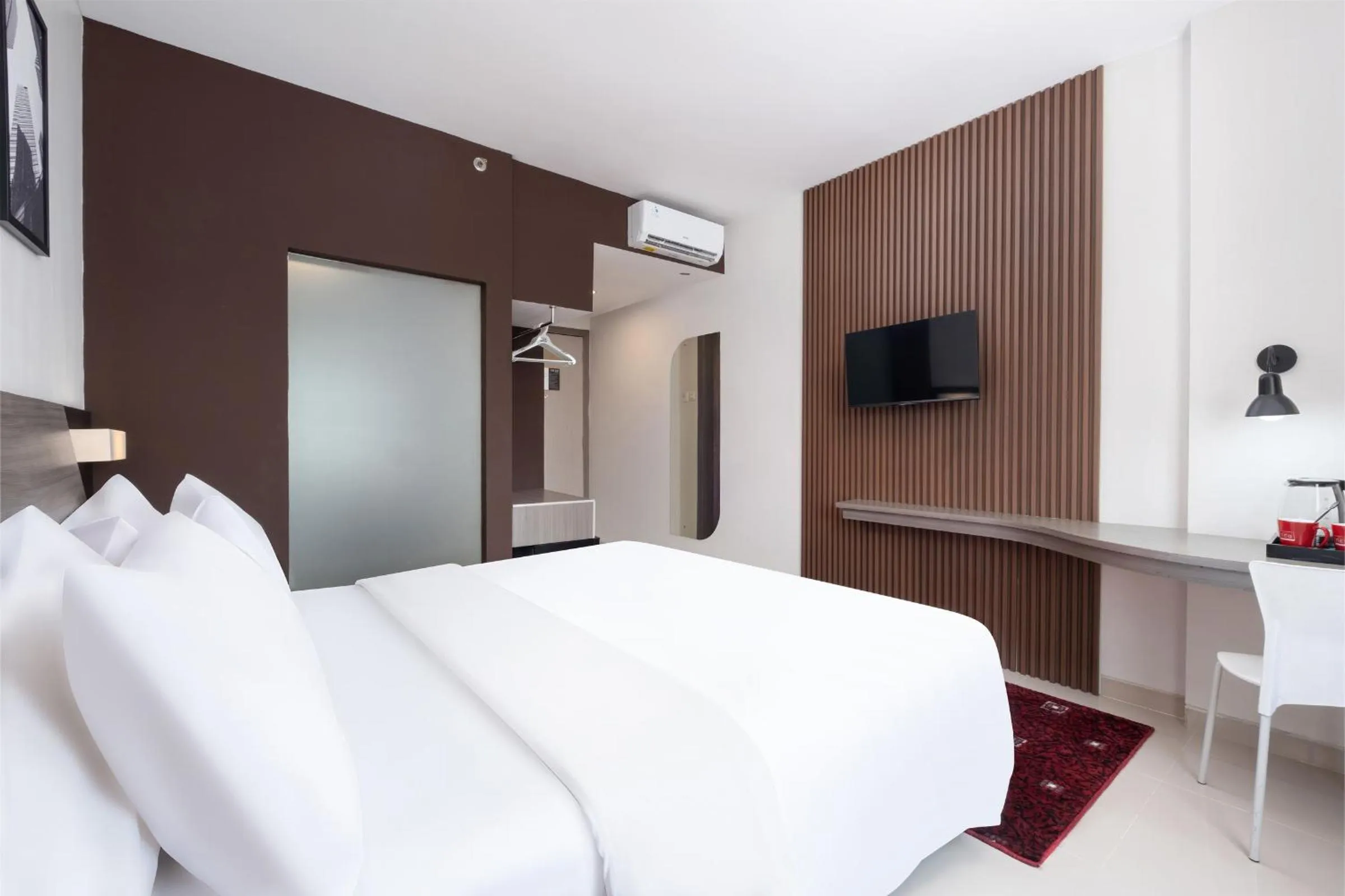 Bed in Hotel Neo Candi Simpang Lima - Semarang by ASTON