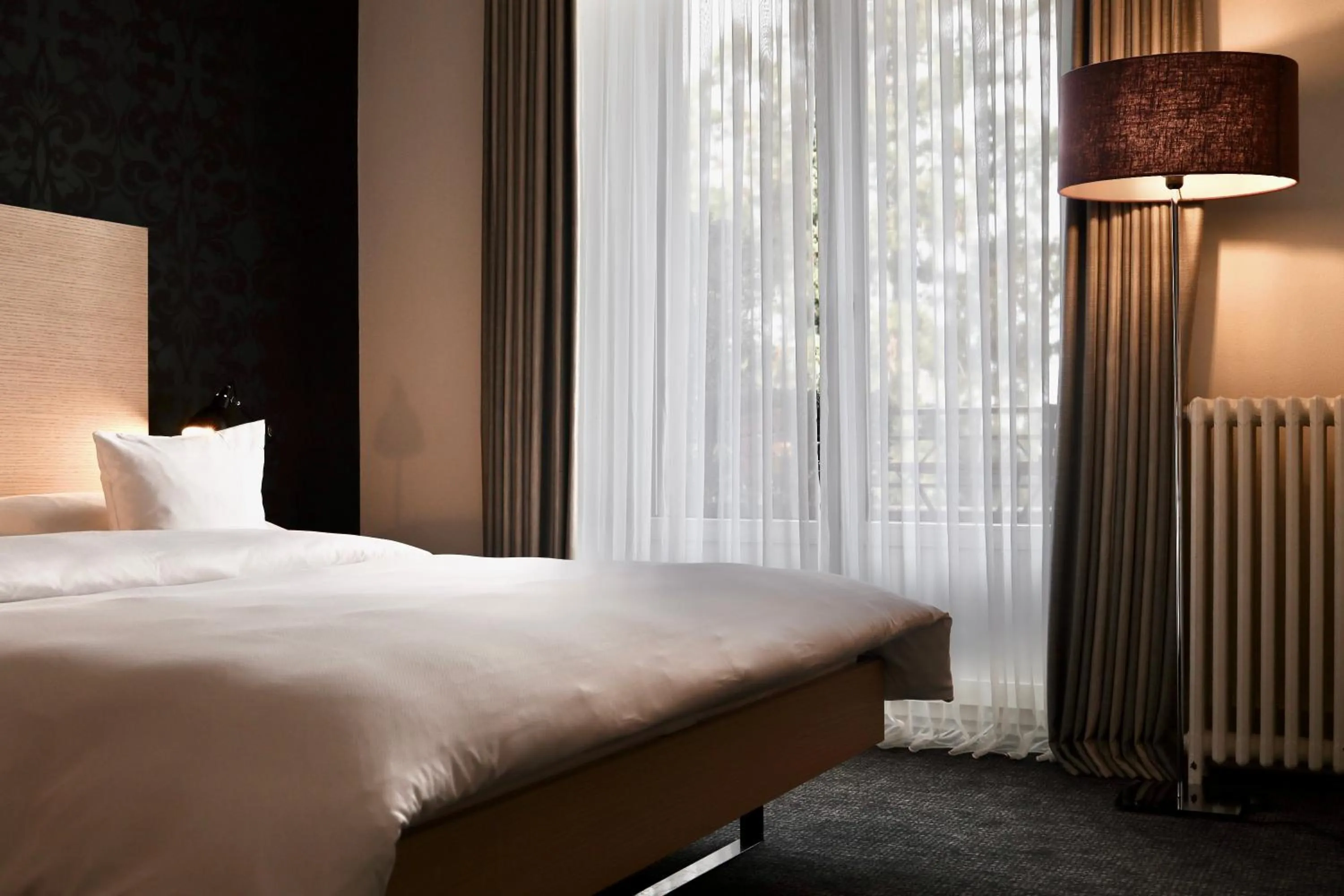 Bed in Hotel Mon Repos