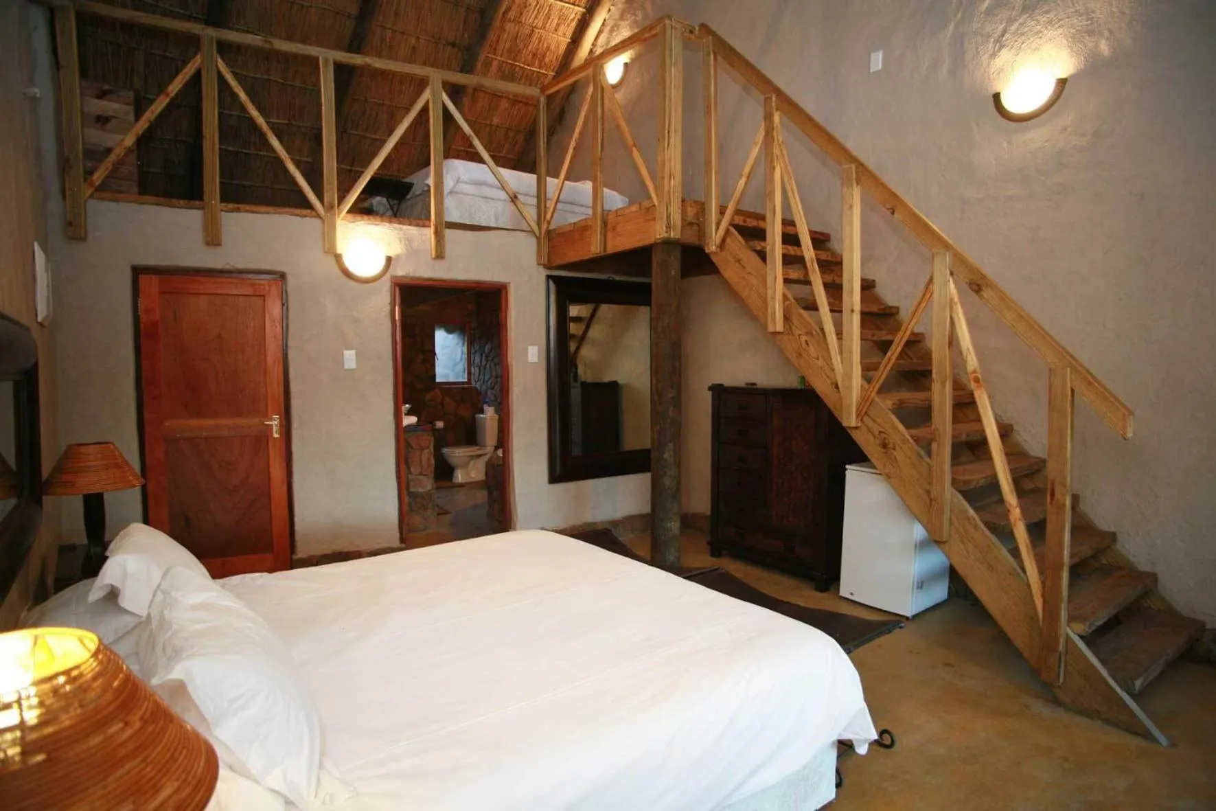 Photo of the whole room, Bed in Aquila Private Game Reserve & Spa