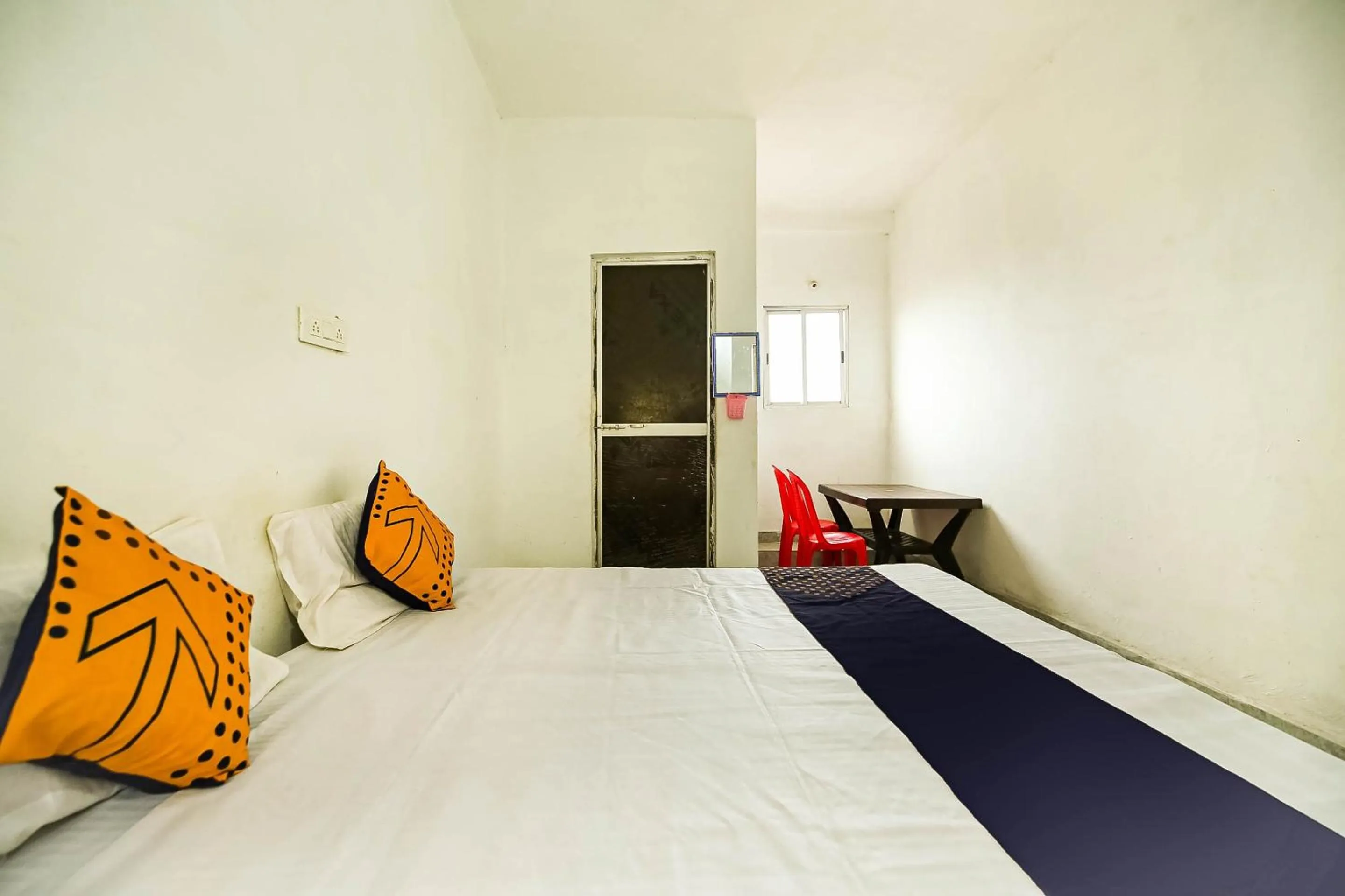Bedroom, Bed in SPOT ON by OYO Krishna Market And Lodge