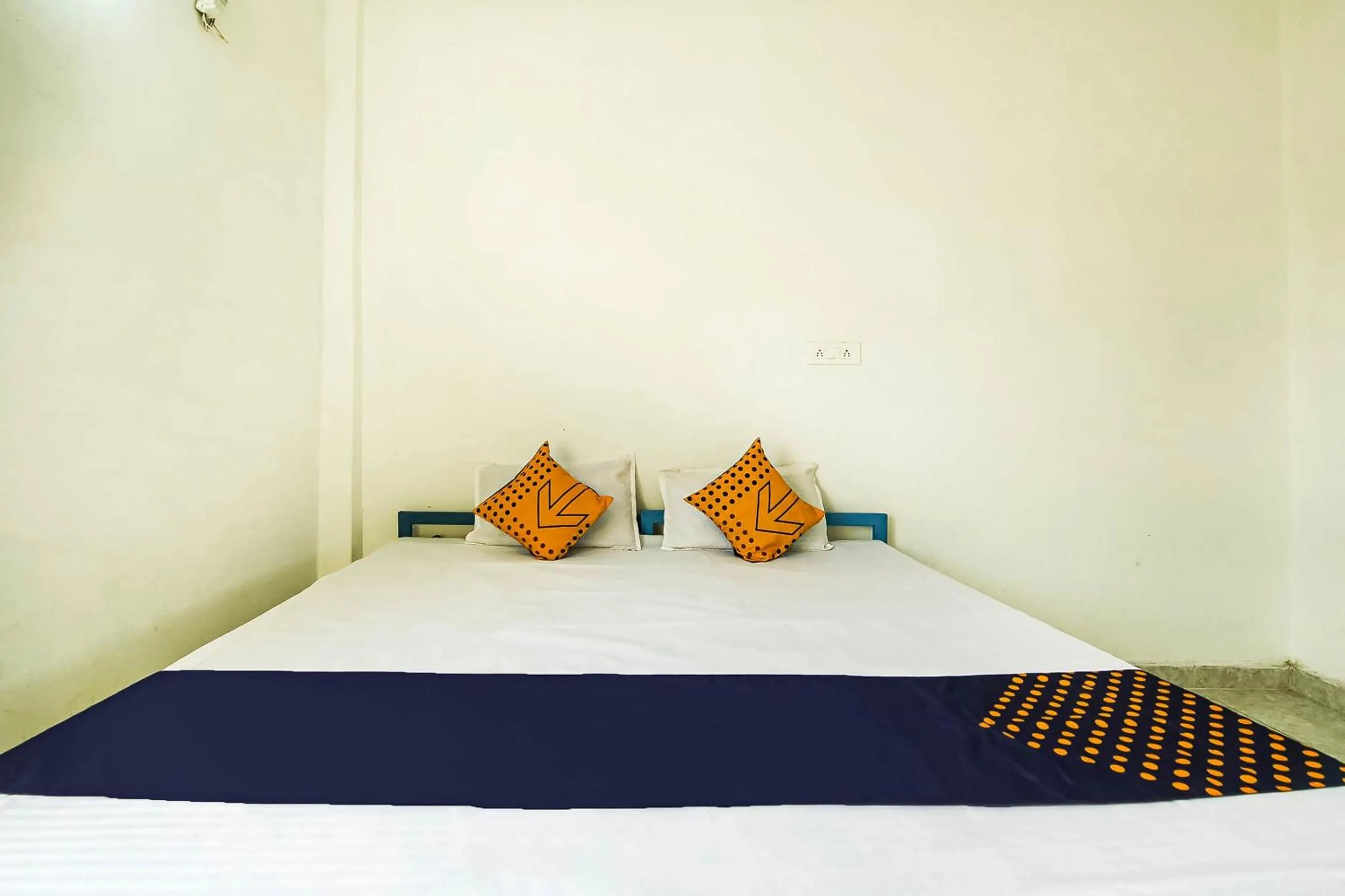 Bedroom, Bed in SPOT ON by OYO Krishna Market And Lodge