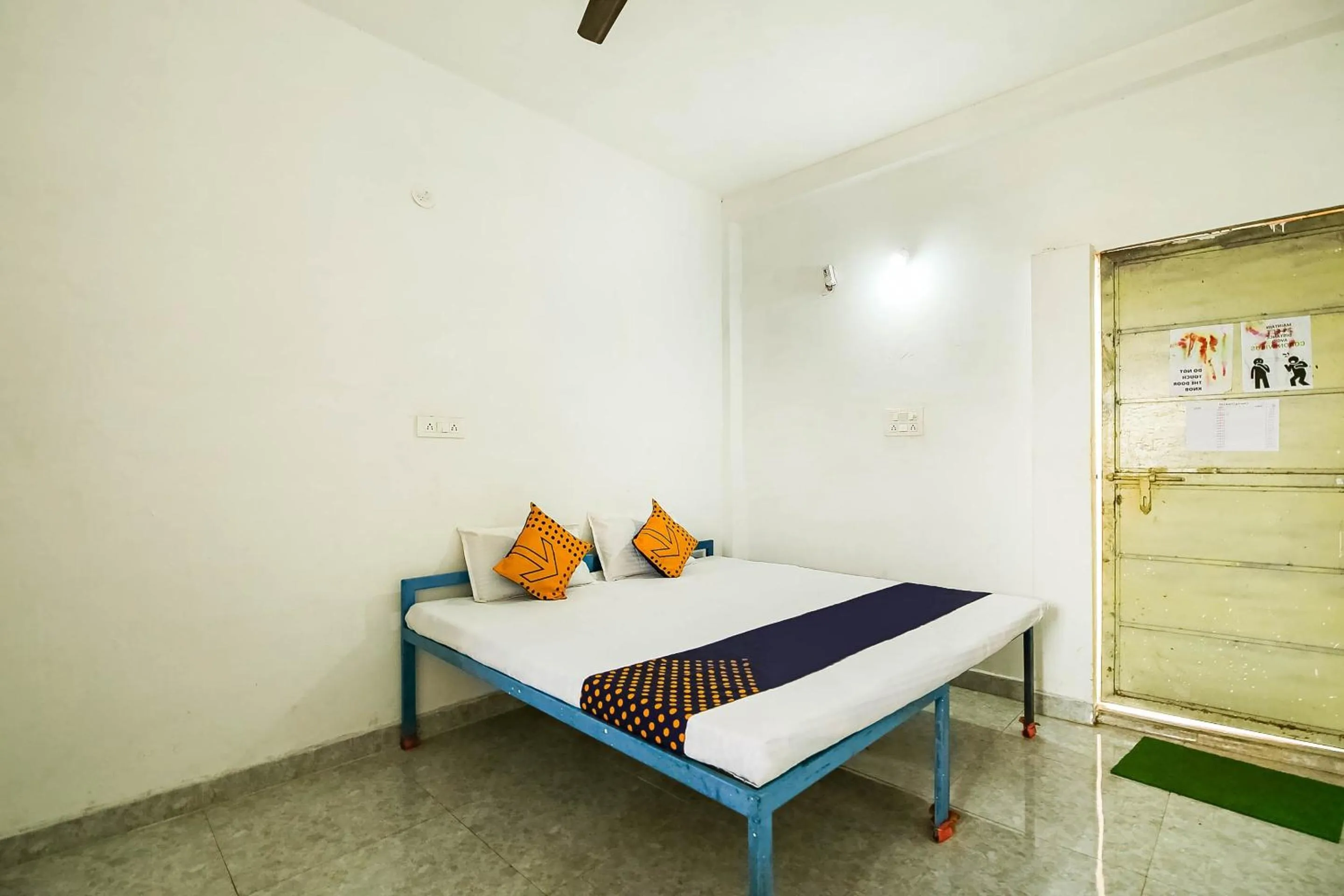 Bedroom, Bed in SPOT ON by OYO Krishna Market And Lodge