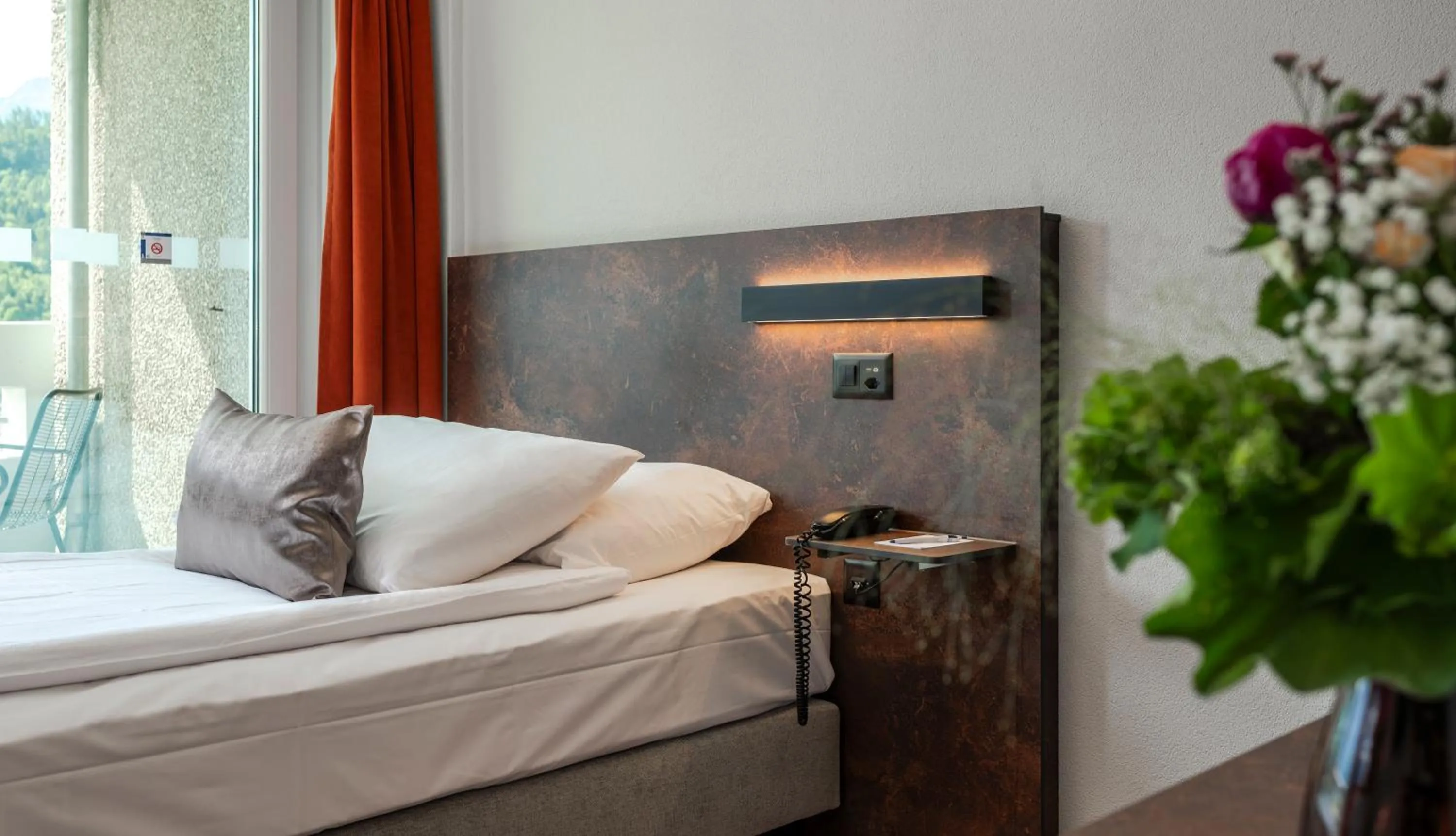 Bedroom, Bed in Hotel Metropole Interlaken