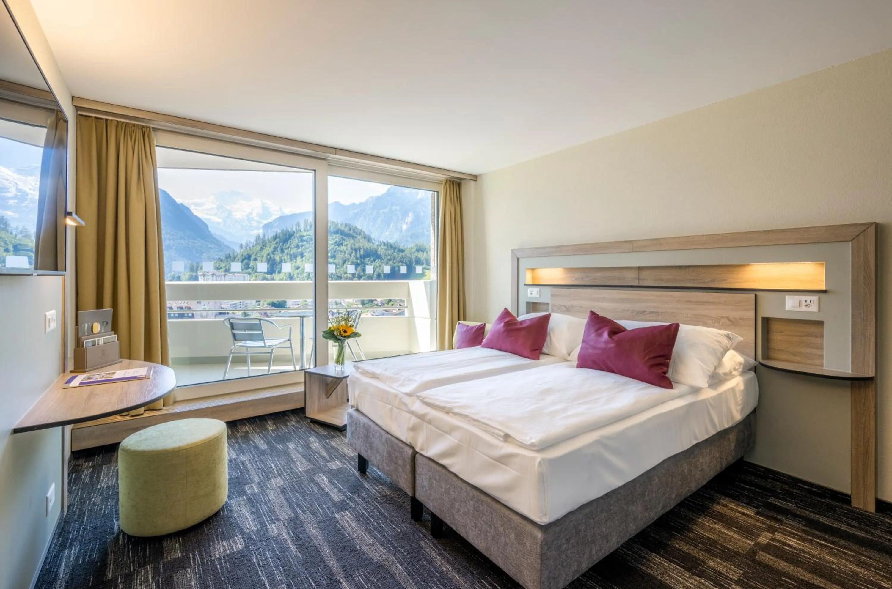 Photo of the whole room, Bed in Hotel Metropole Interlaken