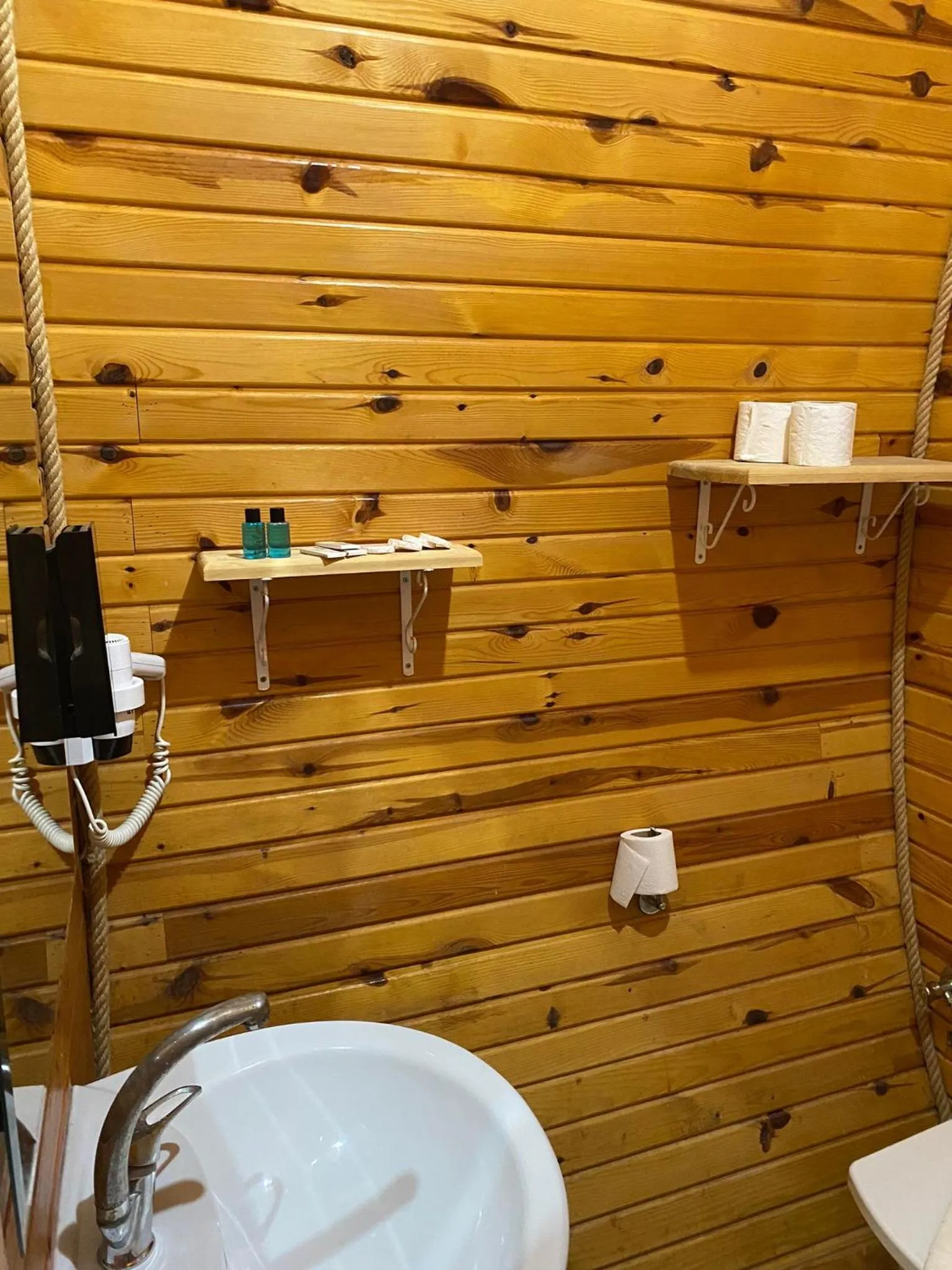 Shower in Green Pine Bungalows & Beach Luxury Concept