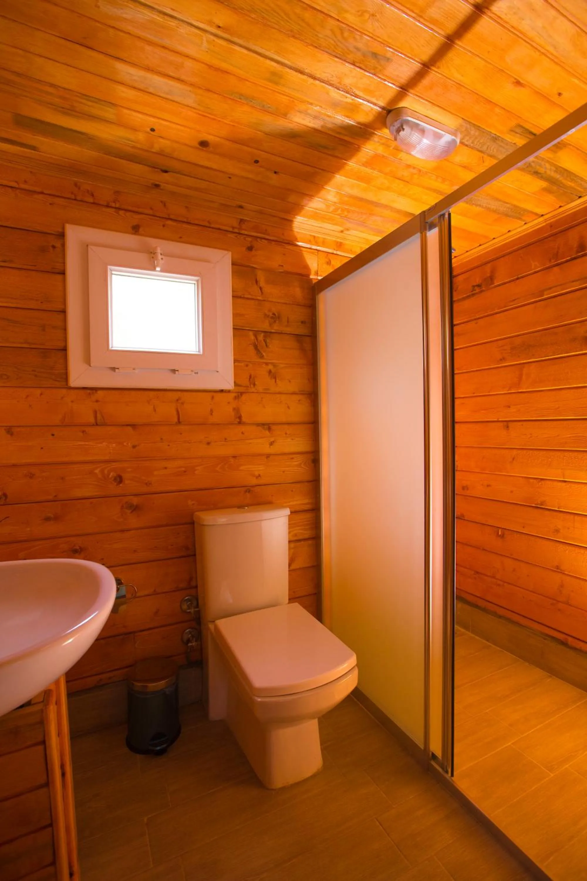 Shower in Green Pine Bungalows & Beach Luxury Concept
