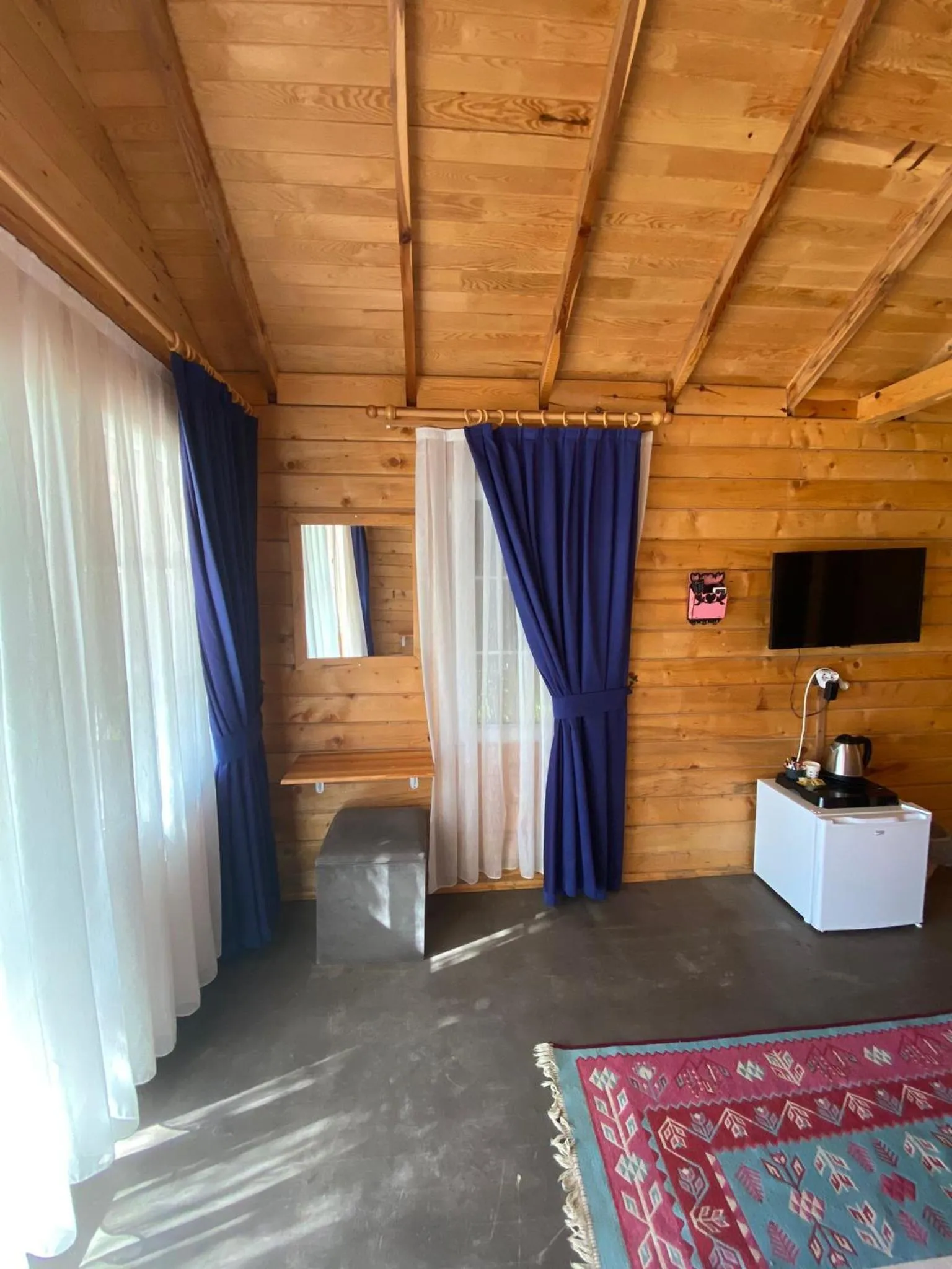 Communal lounge/ TV room, Bed in Green Pine Bungalows & Beach Luxury Concept