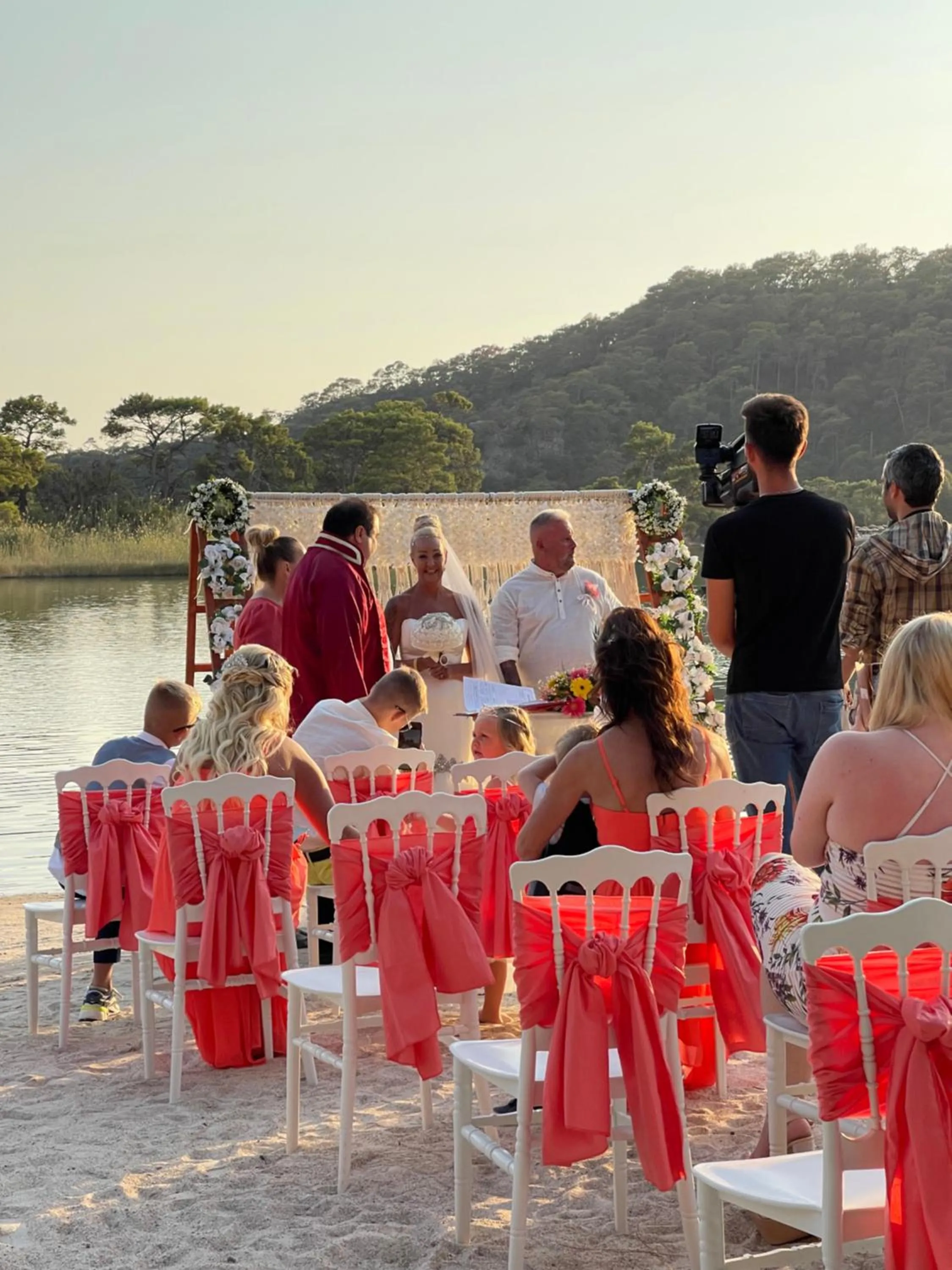 People in Green Pine Bungalows & Beach Luxury Concept