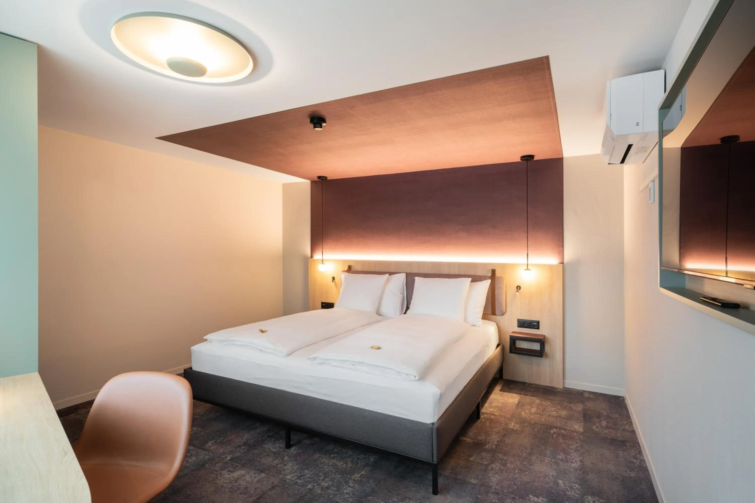 Bed in Stella Swiss Quality Hotel