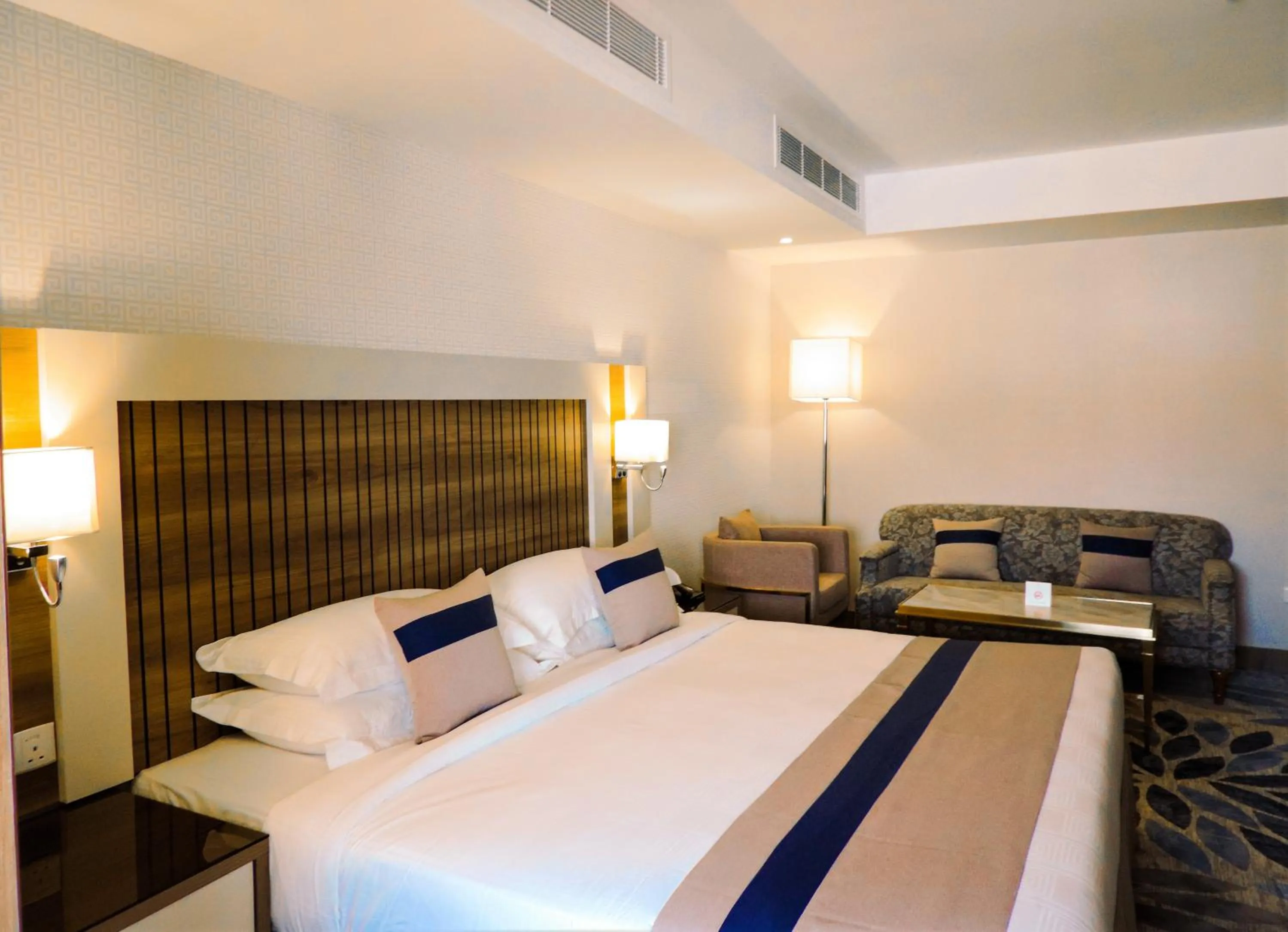 Seating area, Bed in Season Star Hotel Madinah