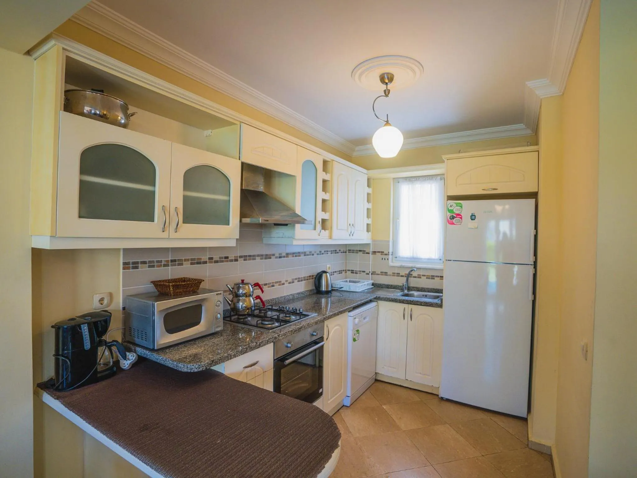 Kitchen or kitchenette in Sunset Beach Resort Aqua Lettings