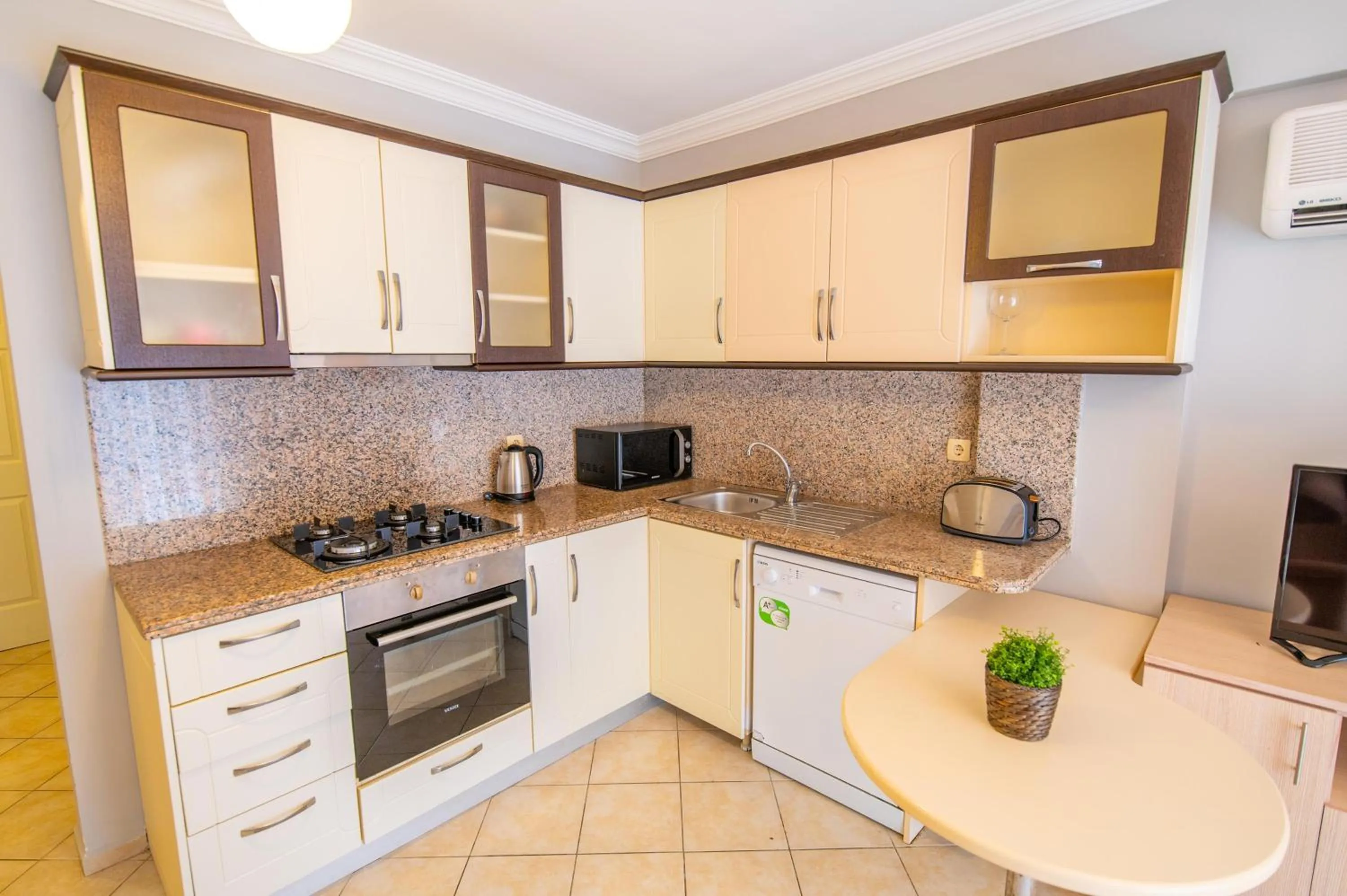 Kitchen or kitchenette in Sunset Beach Resort Aqua Lettings