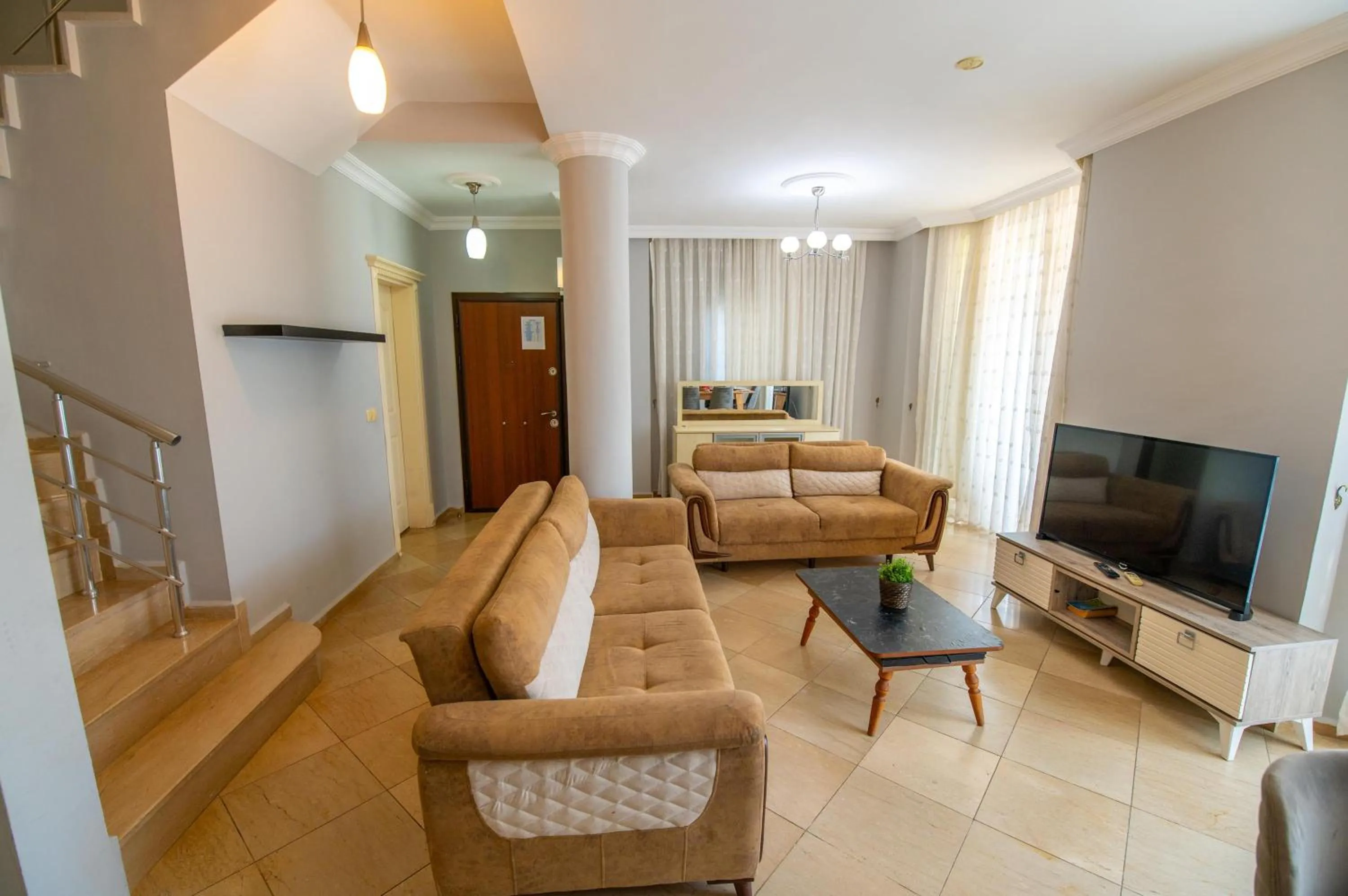 Communal lounge/ TV room in Sunset Beach Resort Aqua Lettings