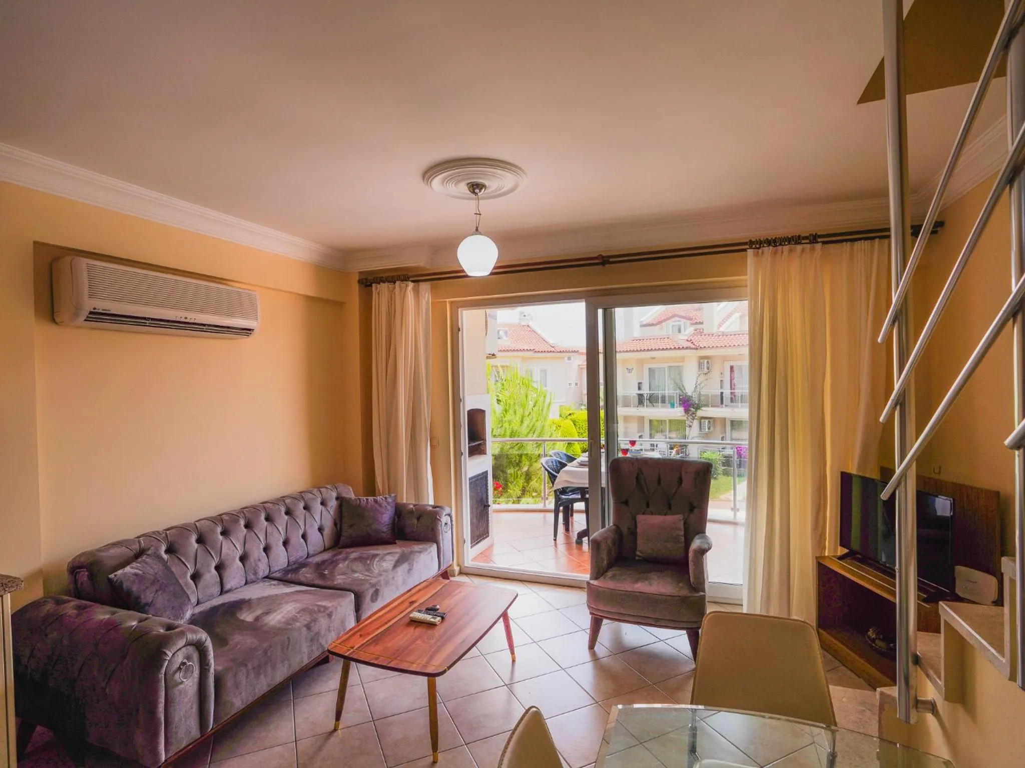 Communal lounge/ TV room in Sunset Beach Resort Aqua Lettings