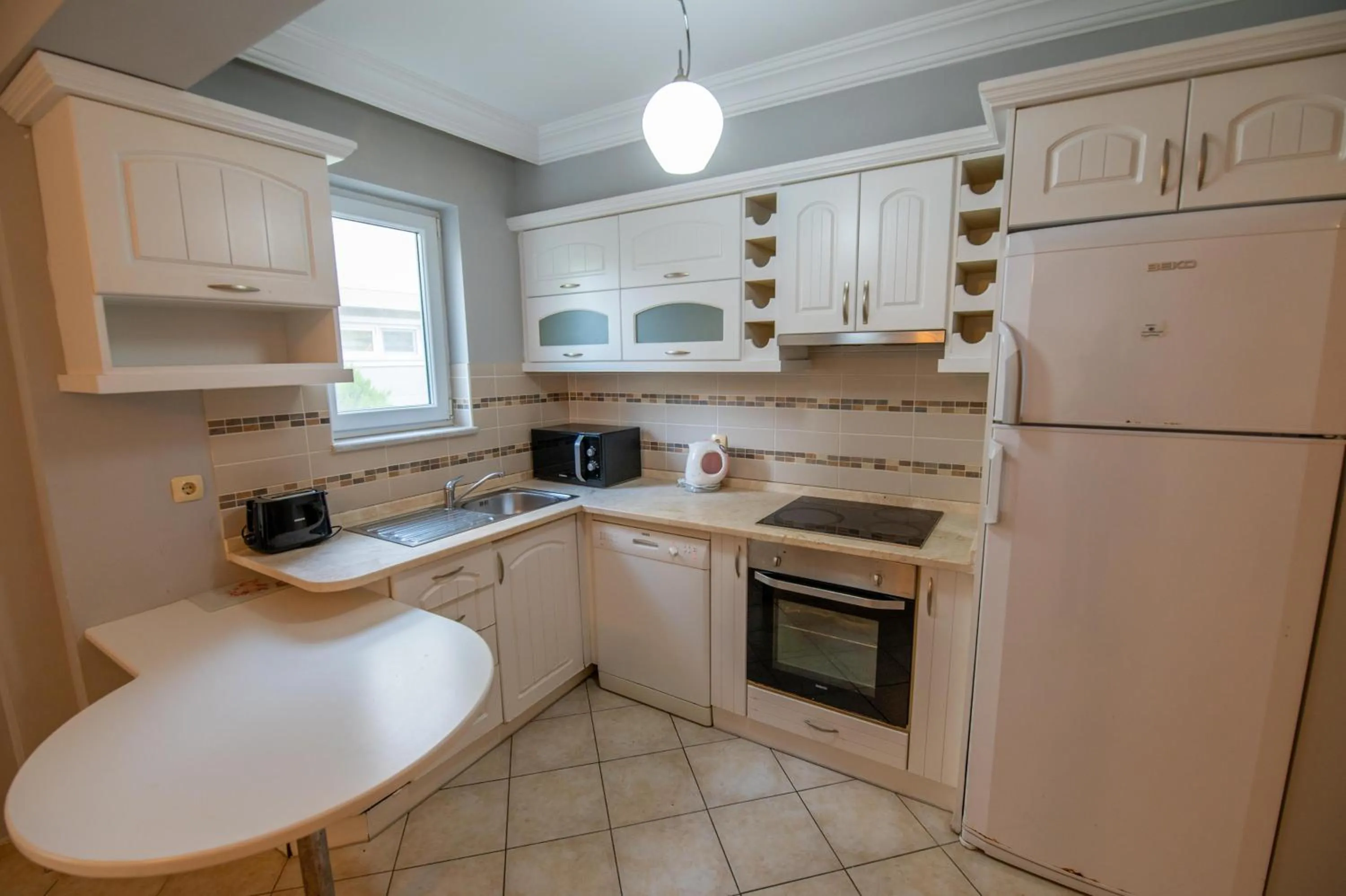 Kitchen or kitchenette in Sunset Beach Resort Aqua Lettings