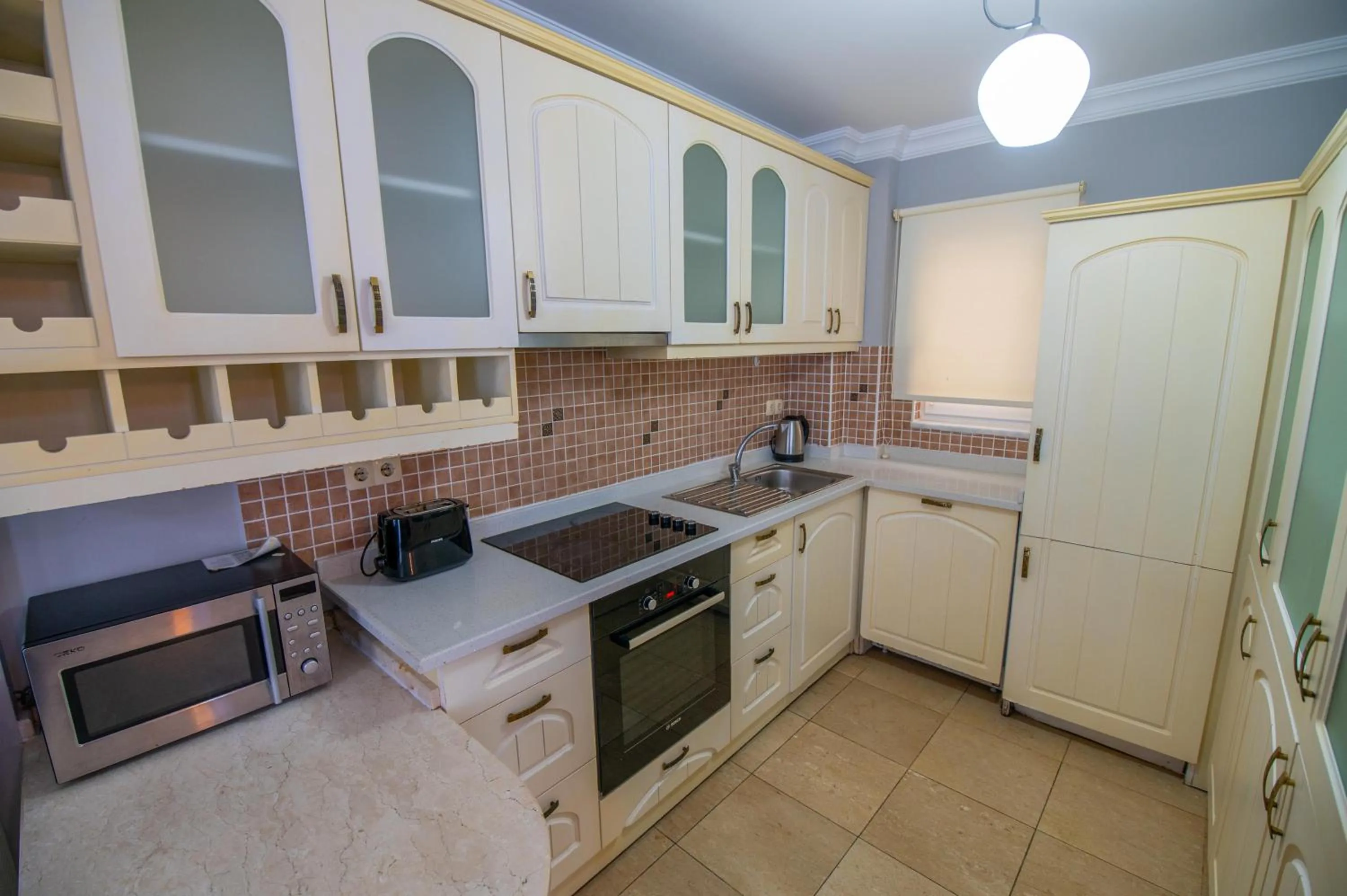 Kitchen or kitchenette in Sunset Beach Resort Aqua Lettings