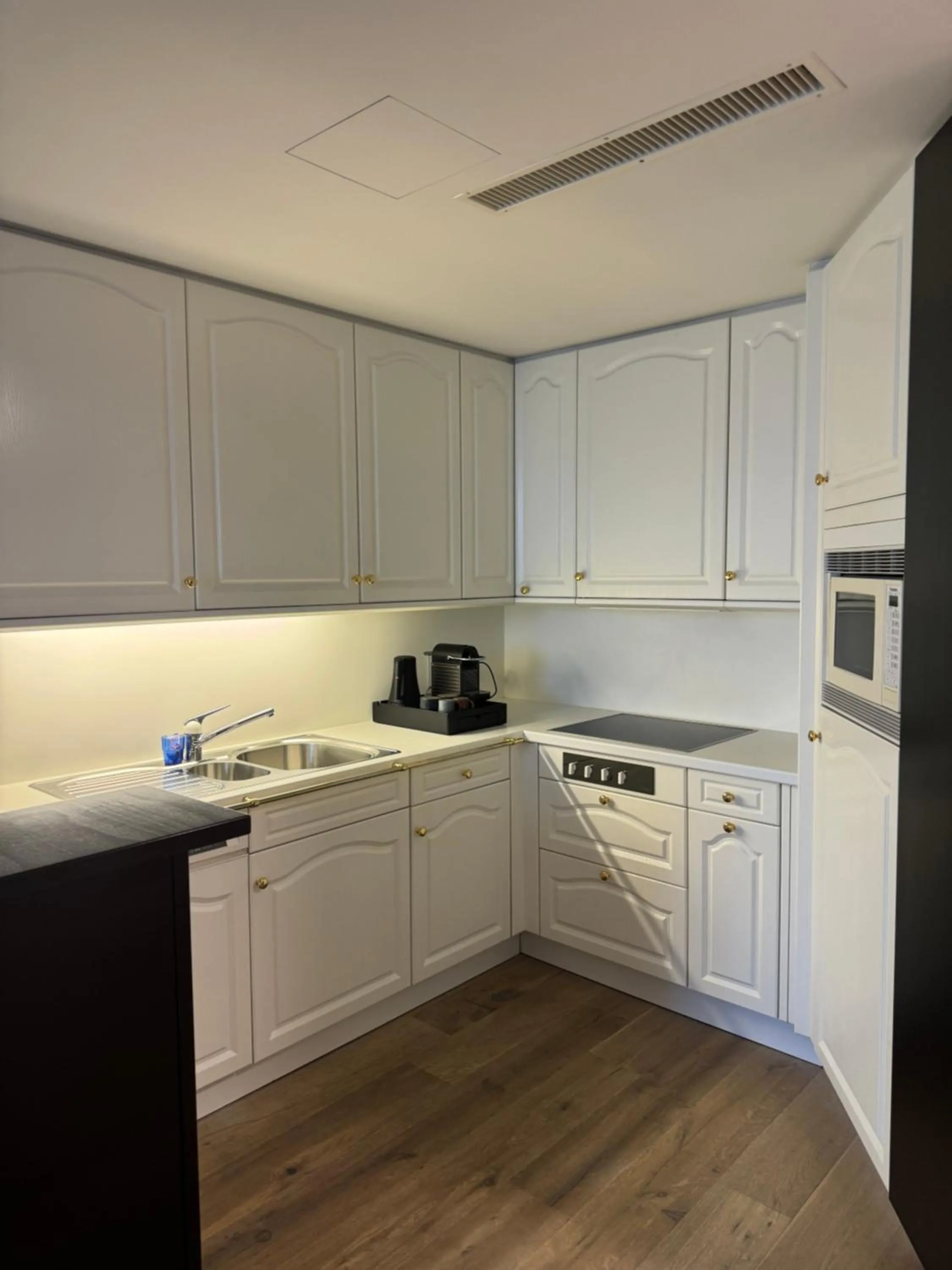 Kitchen or kitchenette in Hotel Monopol Luzern