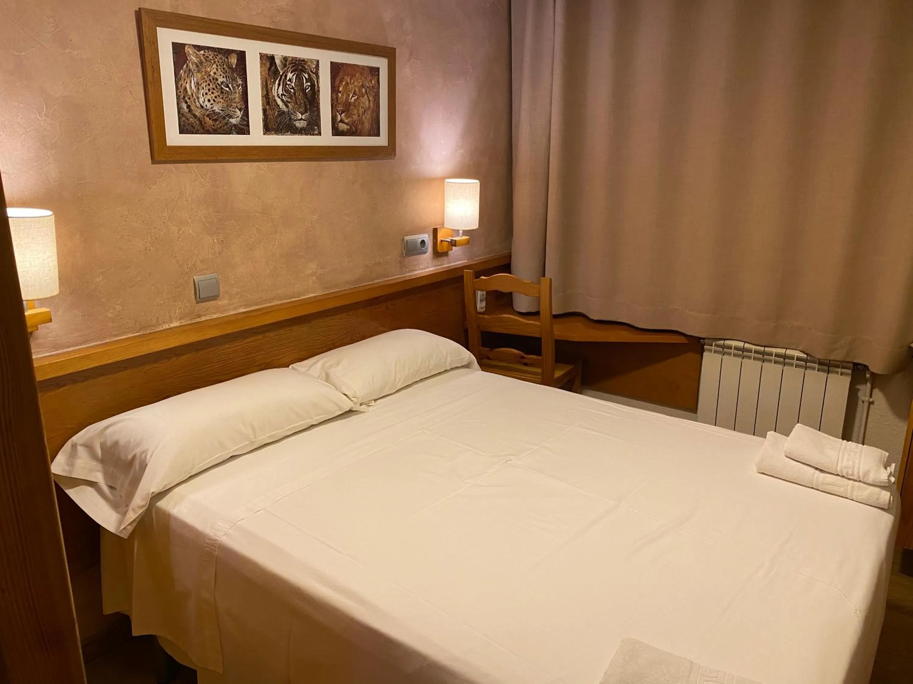 Photo of the whole room, Bed in HOSTAL GALICIA CARDEDEU
