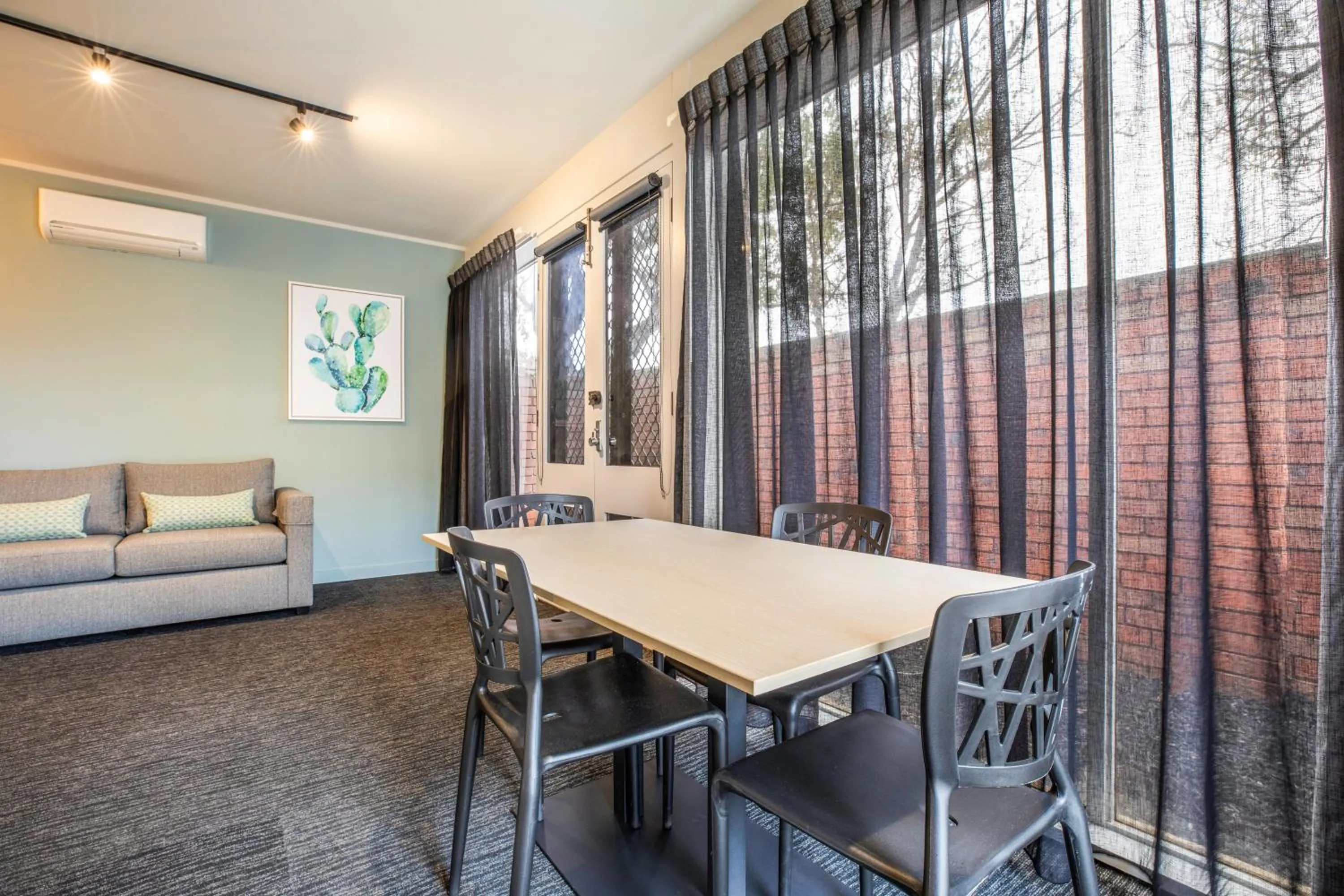 Seating area in Nightcap at Excelsior Hotel