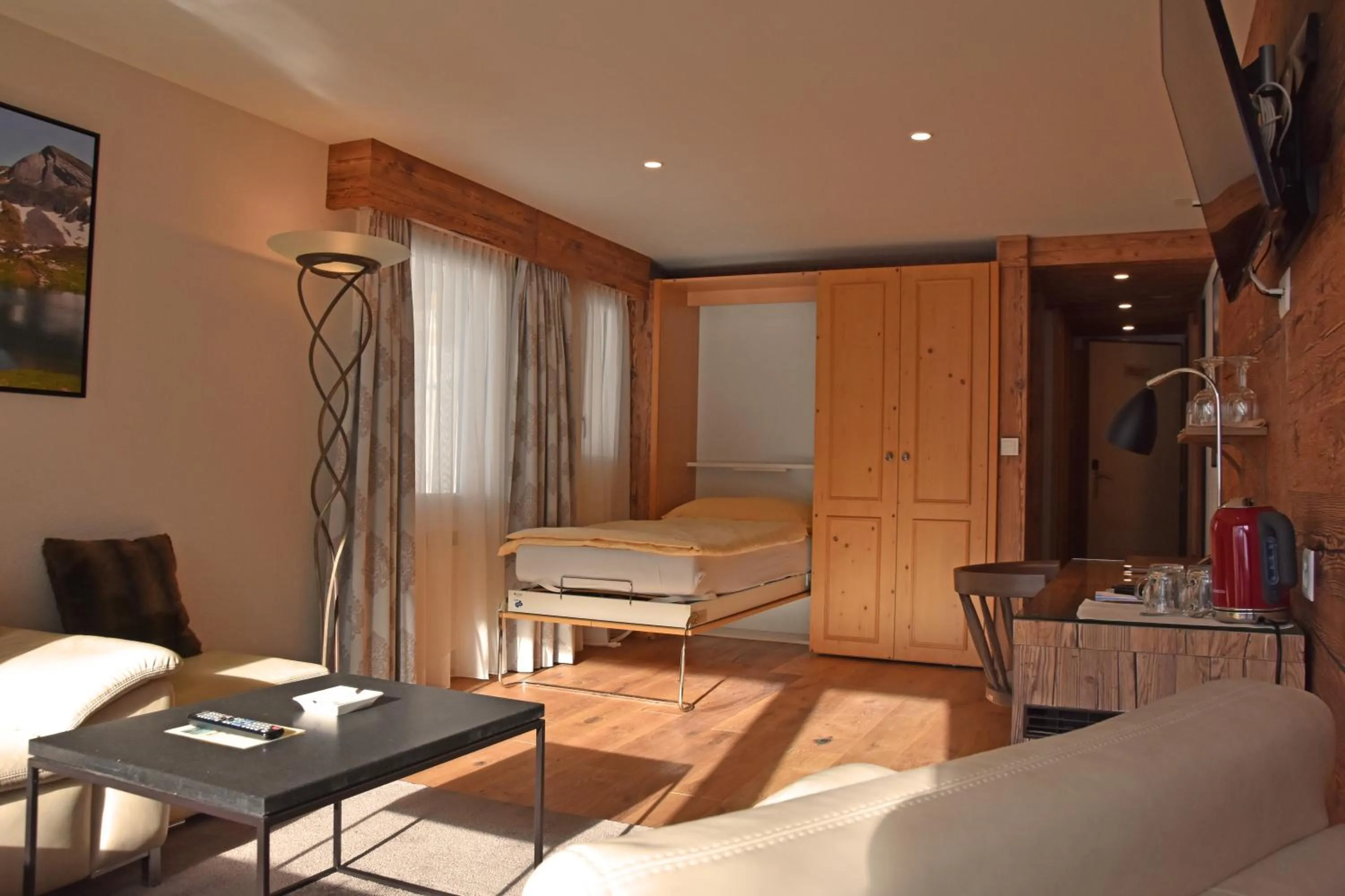 Photo of the whole room, Bed in Eiger Mürren Swiss Quality Hotel