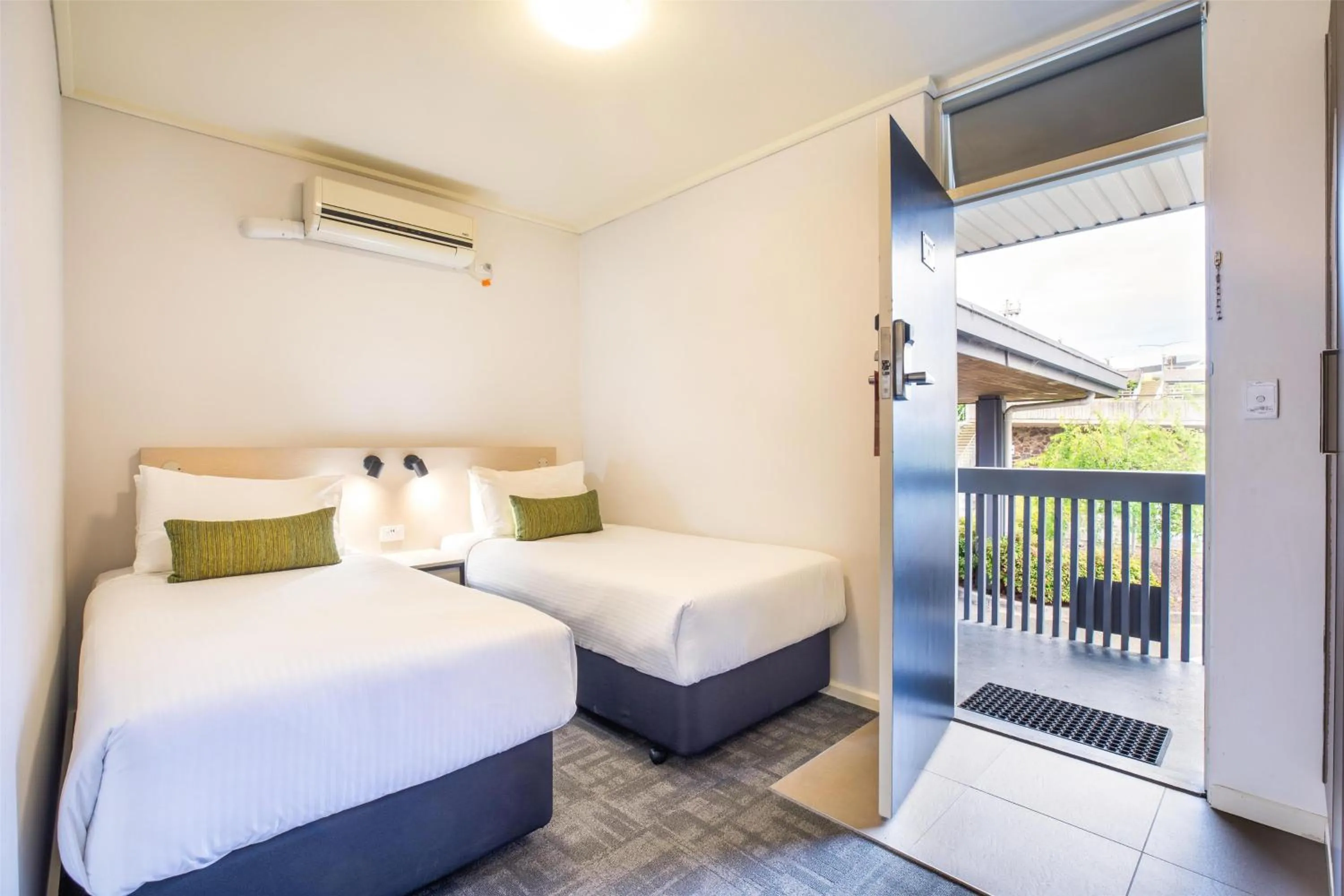 Bedroom, Bed in Nightcap at Shoppingtown Hotel