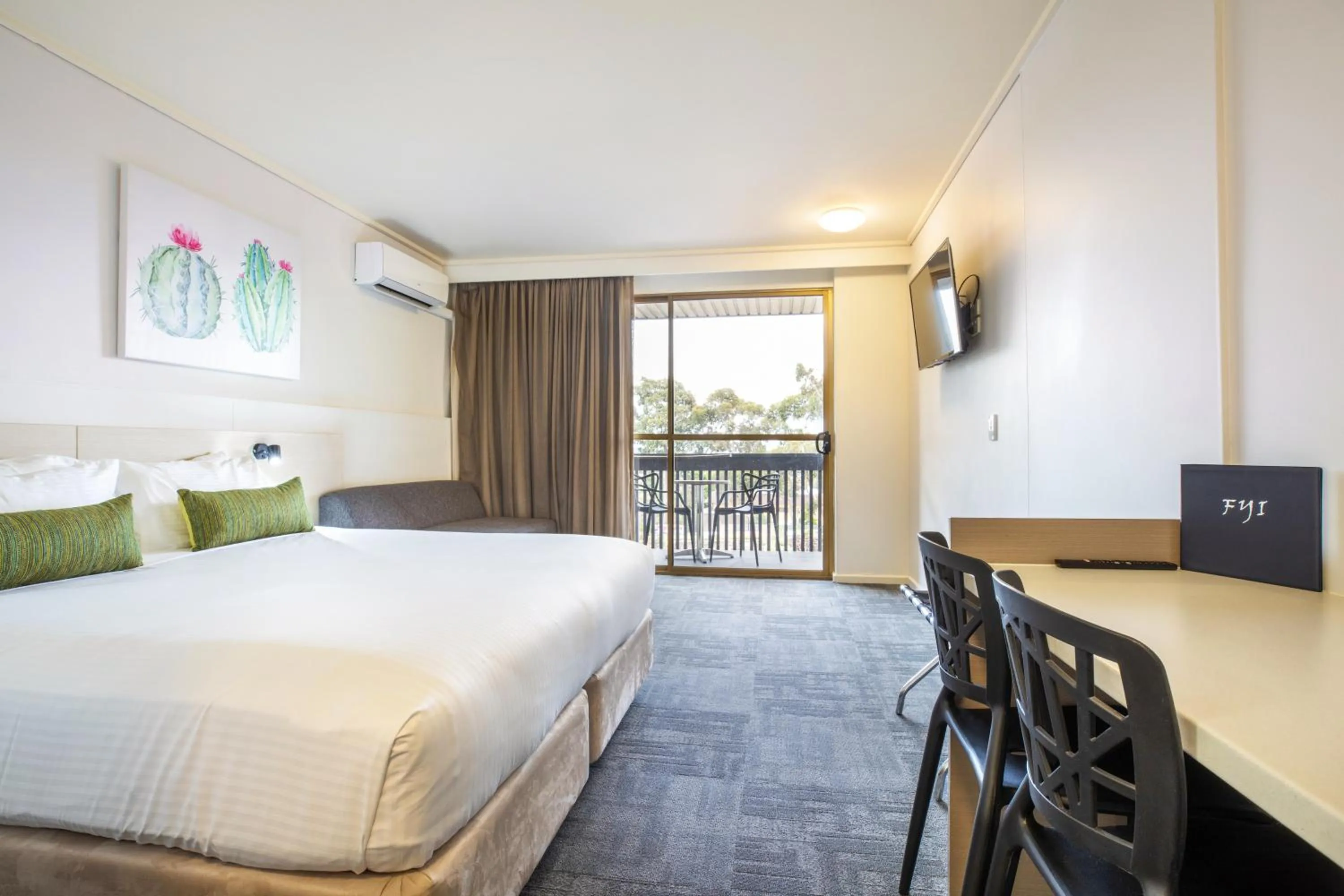 Seating area, Bed in Nightcap at Shoppingtown Hotel