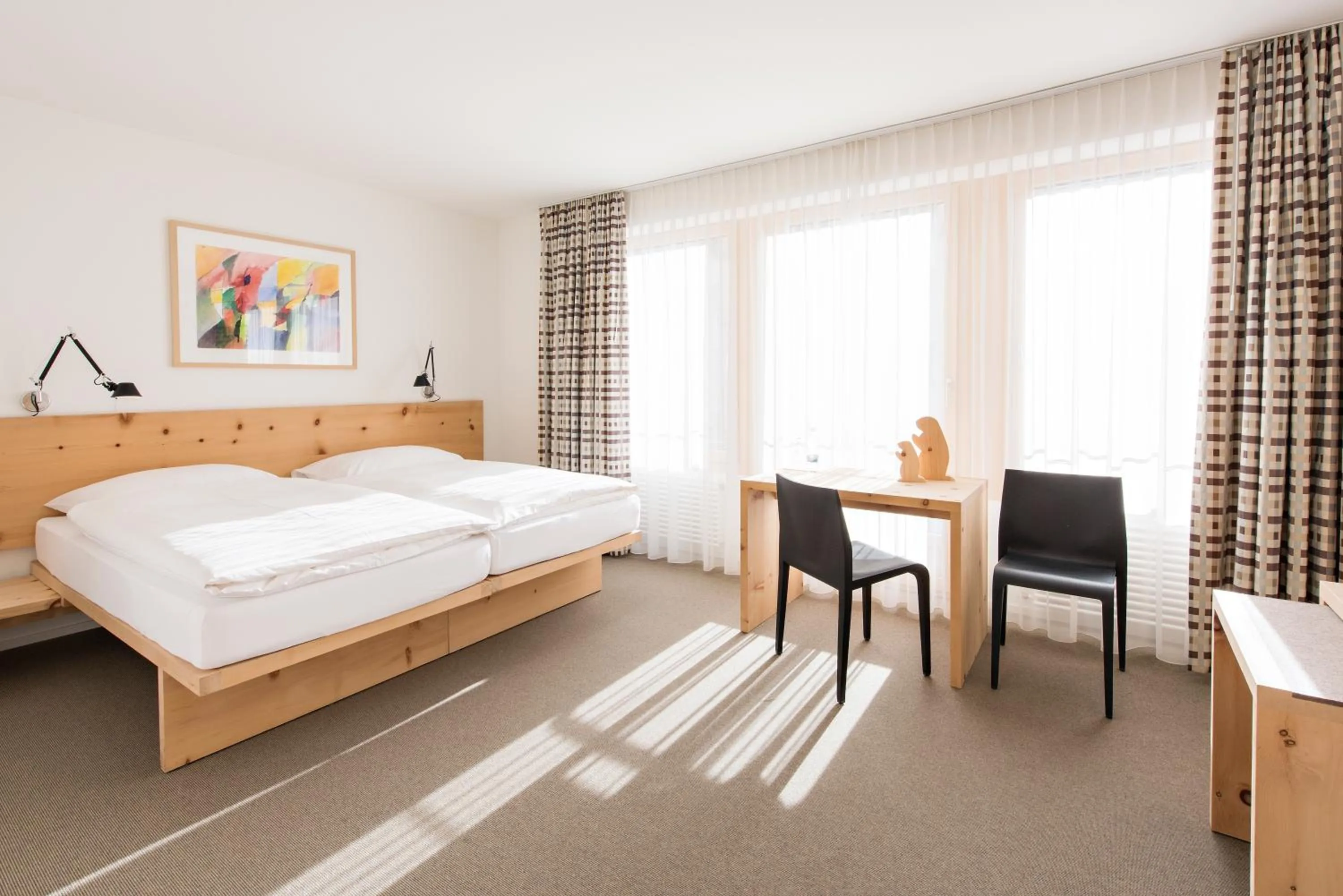 Bed in Hauser Hotel St. Moritz