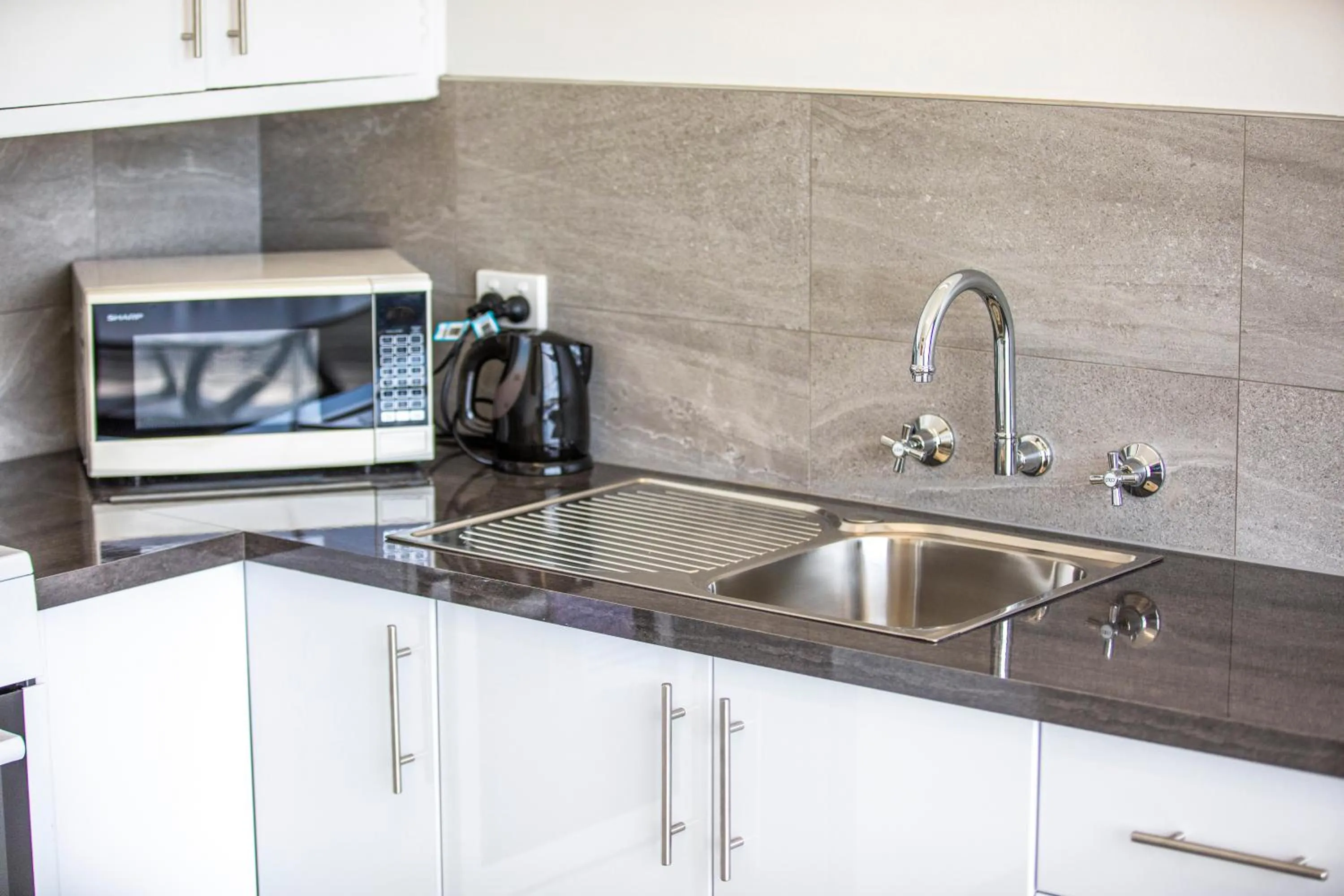 Kitchen or kitchenette in Nightcap at Carlyle Hotel