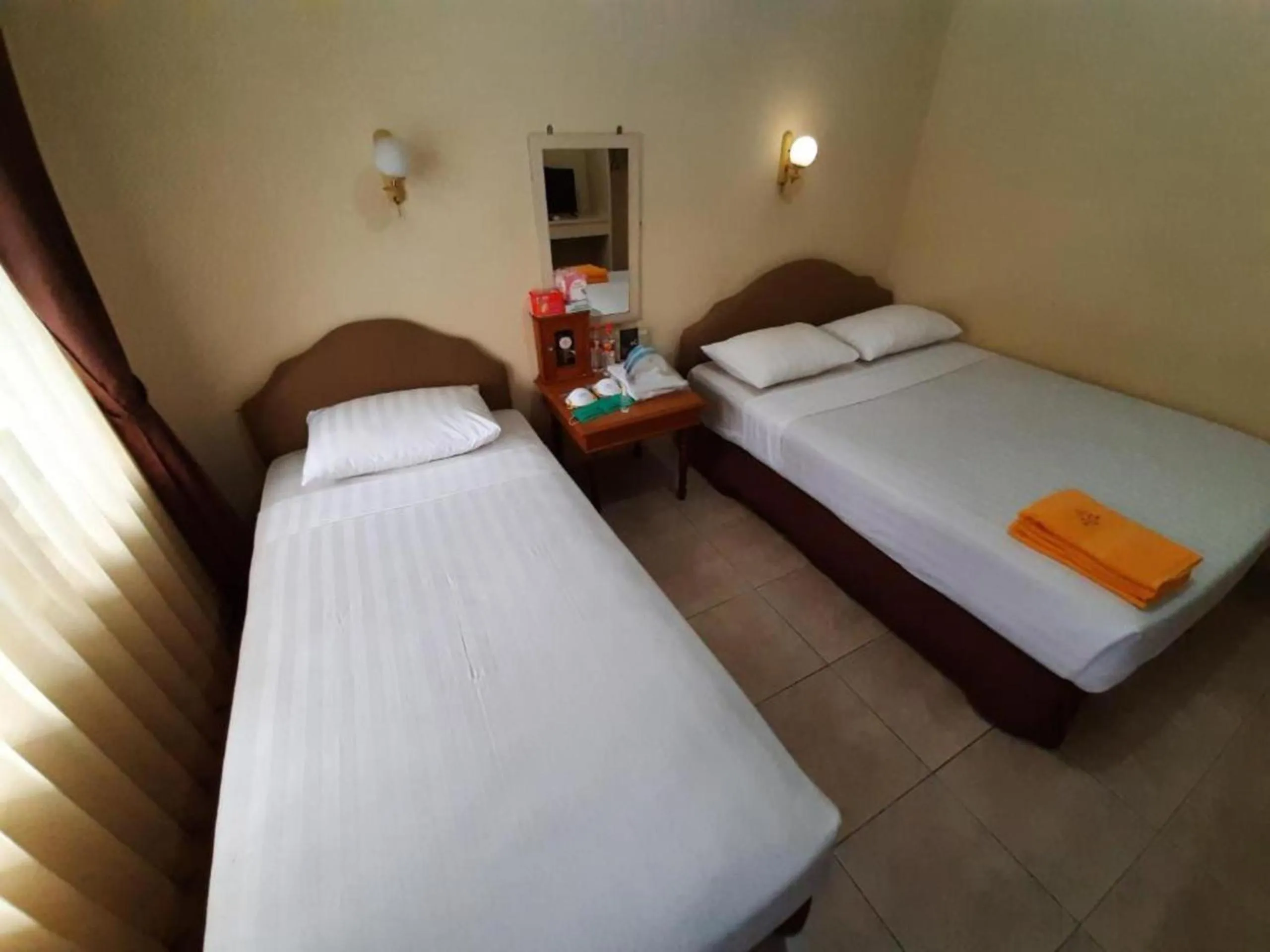 Photo of the whole room, Bed in Hotel Mutiara Baru