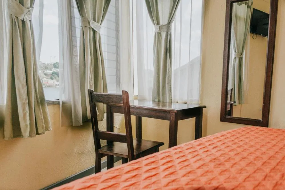 Seating area, Bed in Hotel Sabana