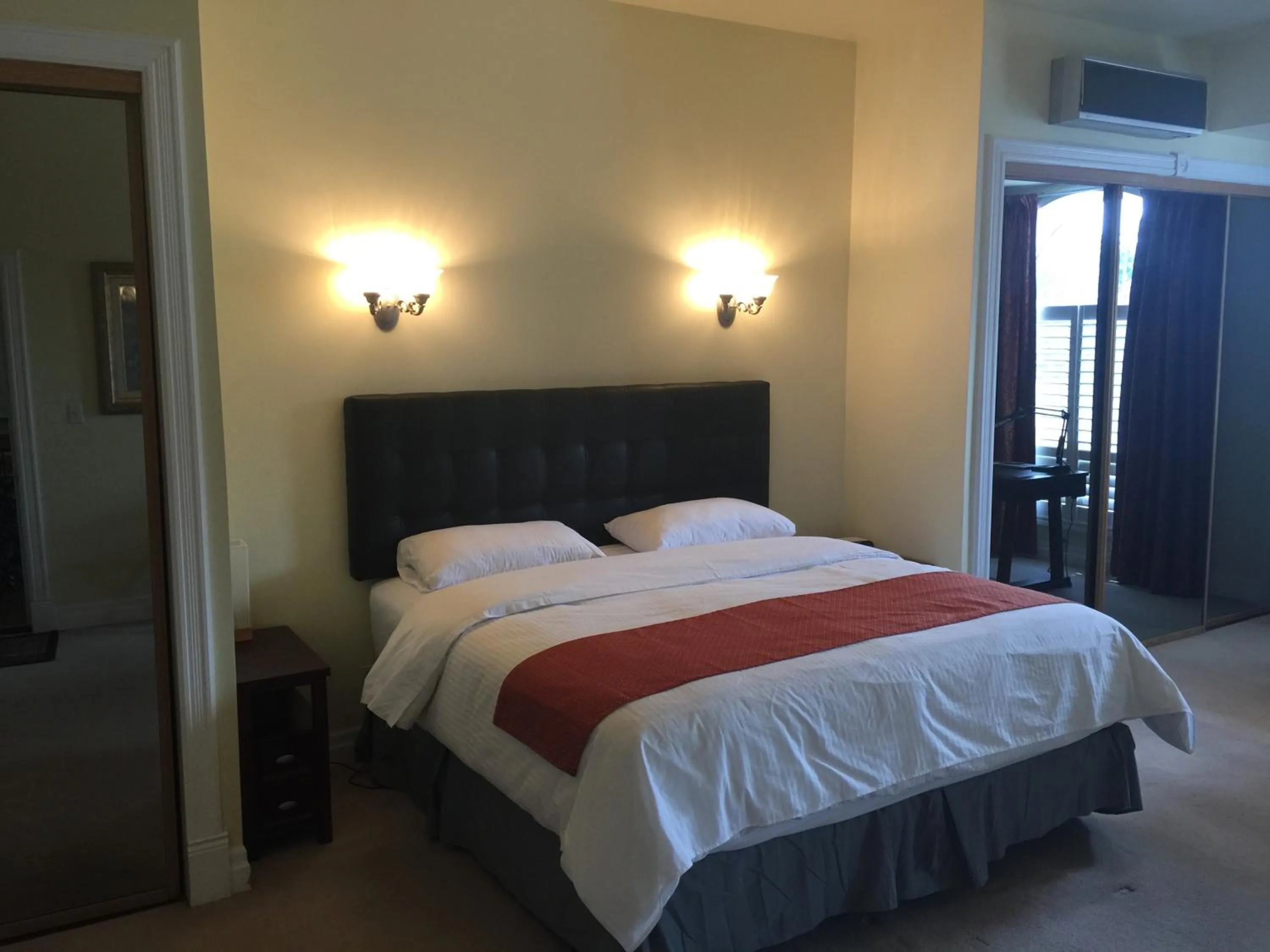 Photo of the whole room, Bed in Grey Rose Suites