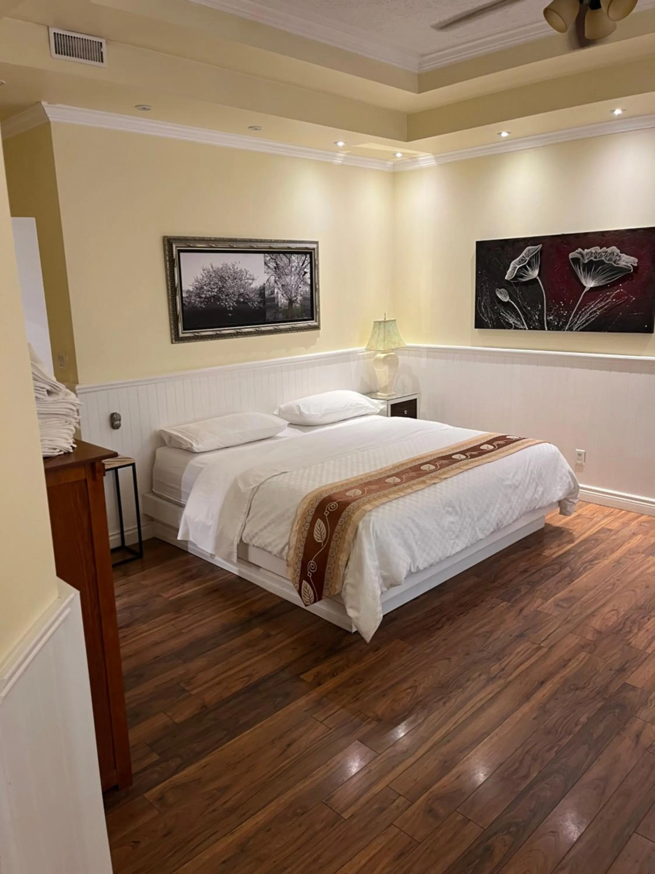 Bed in Grey Rose Suites