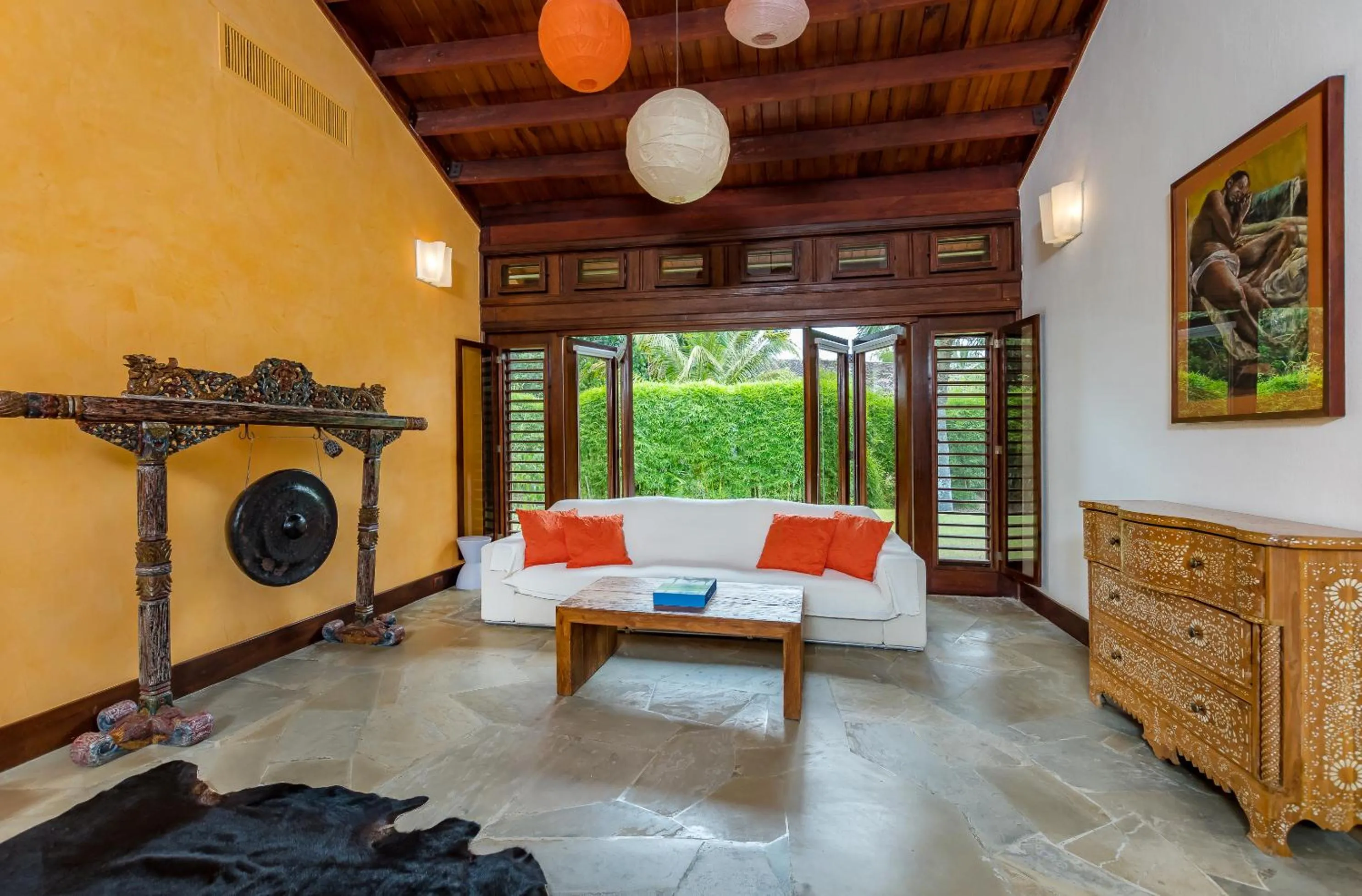 Living room in Unique Villa with Ocean and River Views - Staff & Golf Carts