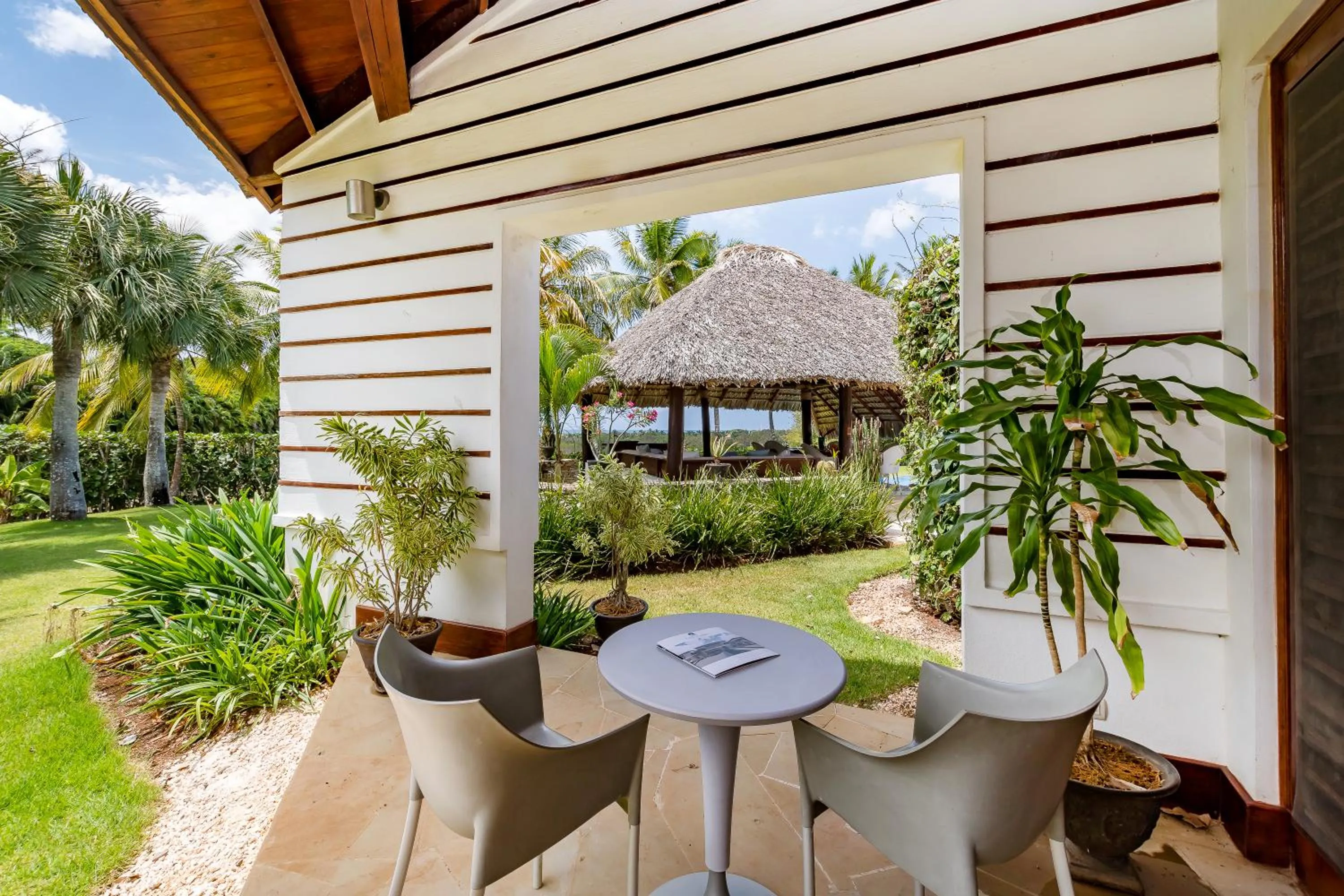 Patio in Unique Villa with Ocean and River Views - Staff & Golf Carts