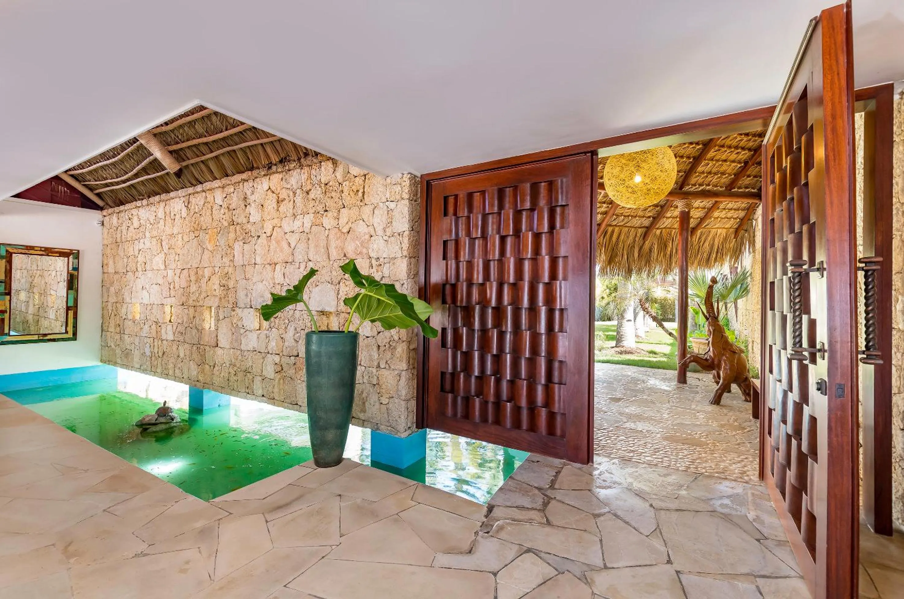 Patio in Unique Villa with Ocean and River Views - Staff & Golf Carts