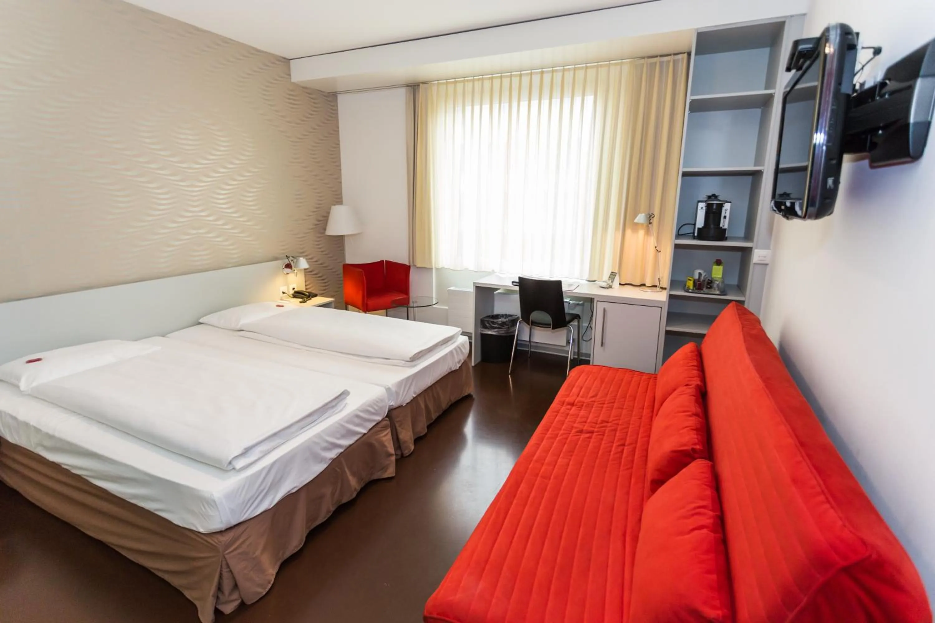 Photo of the whole room, Bed in Sorell Business Hotel Ador Bern
