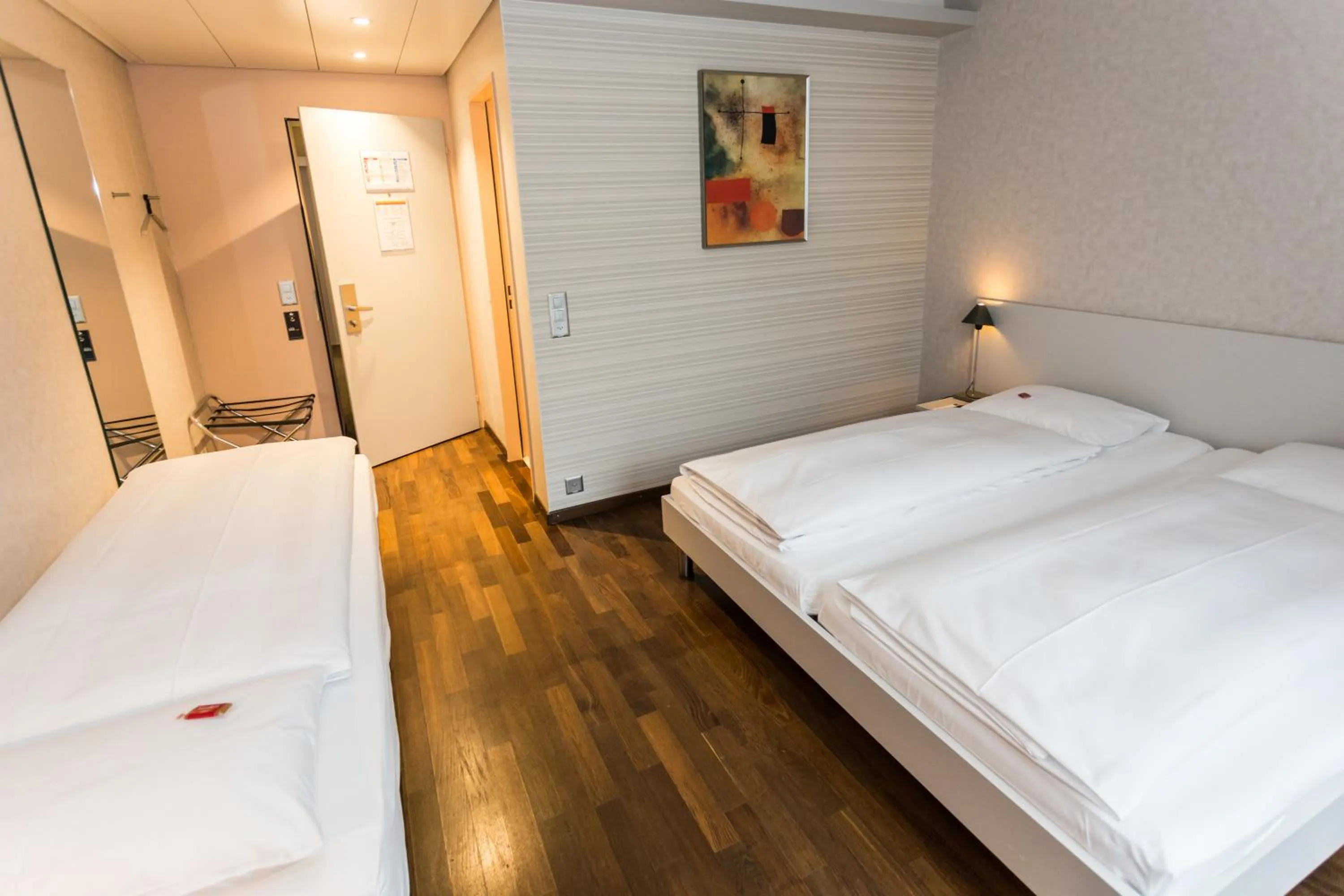 Photo of the whole room, Bed in Sorell Business Hotel Ador Bern