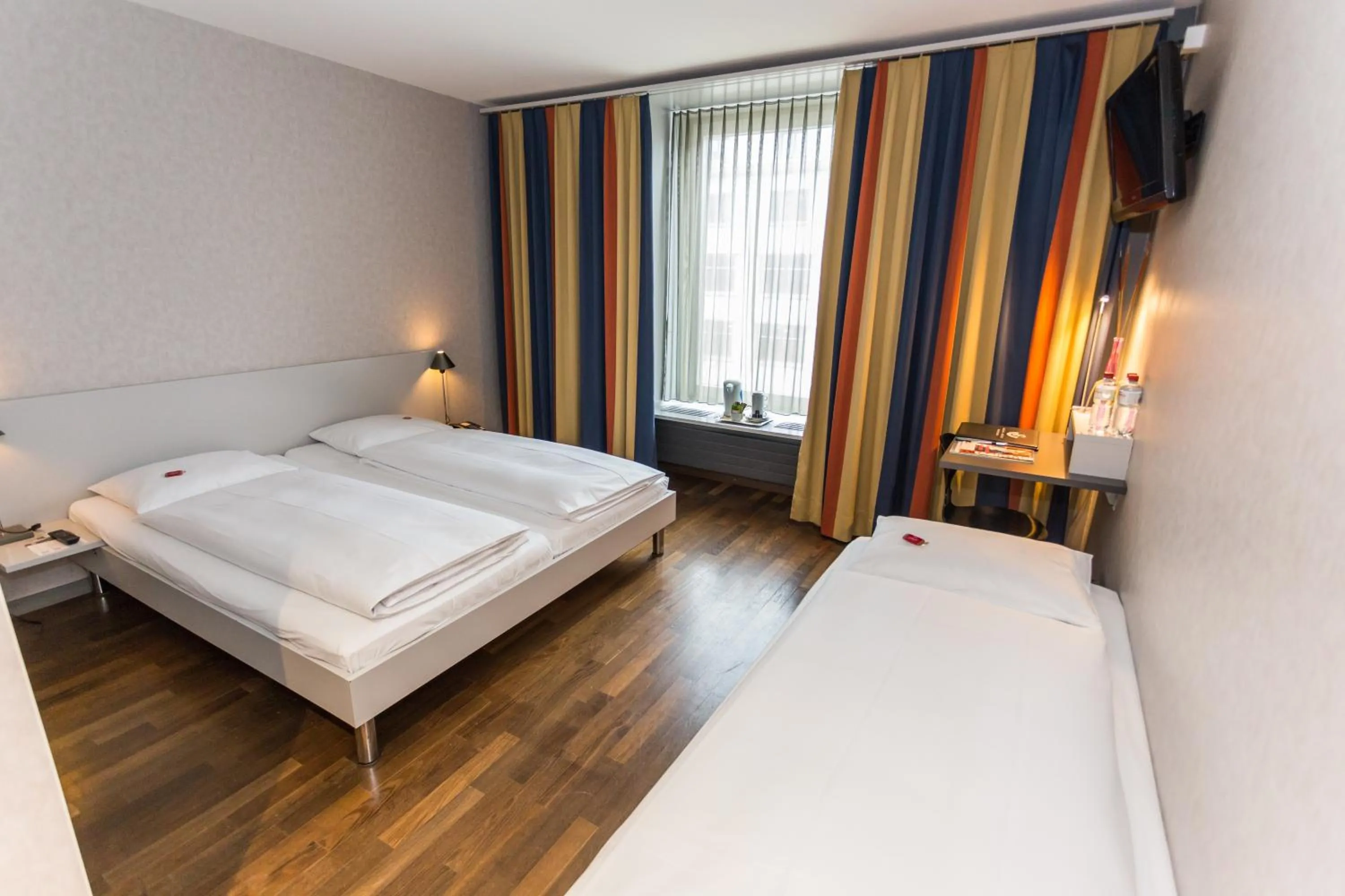 Photo of the whole room, Bed in Sorell Business Hotel Ador Bern