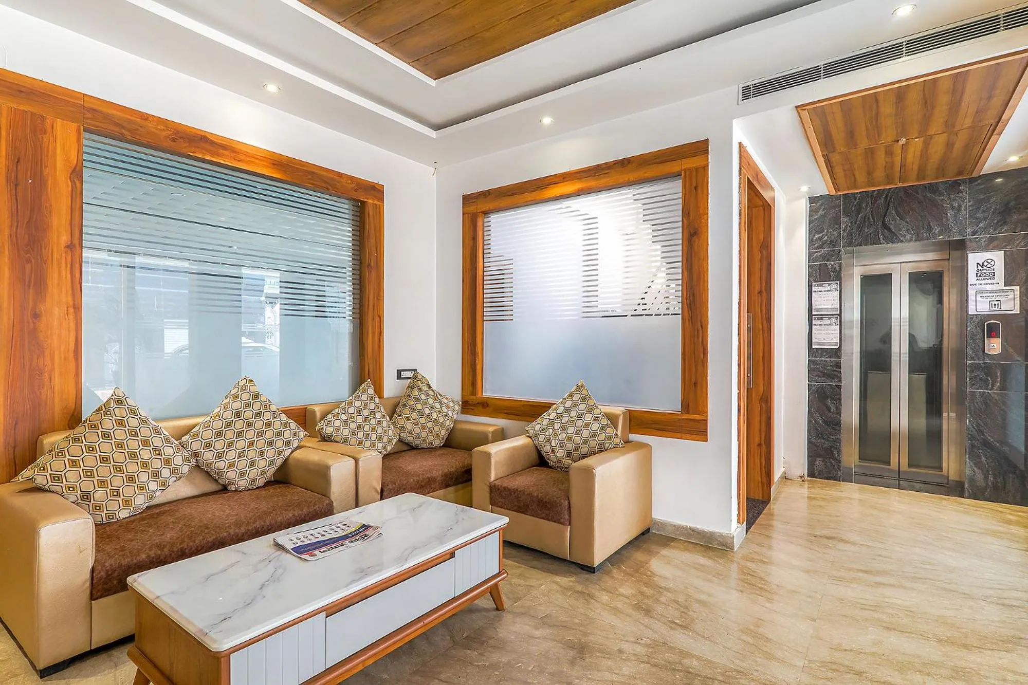 Seating area in FabExpress Global Inn New