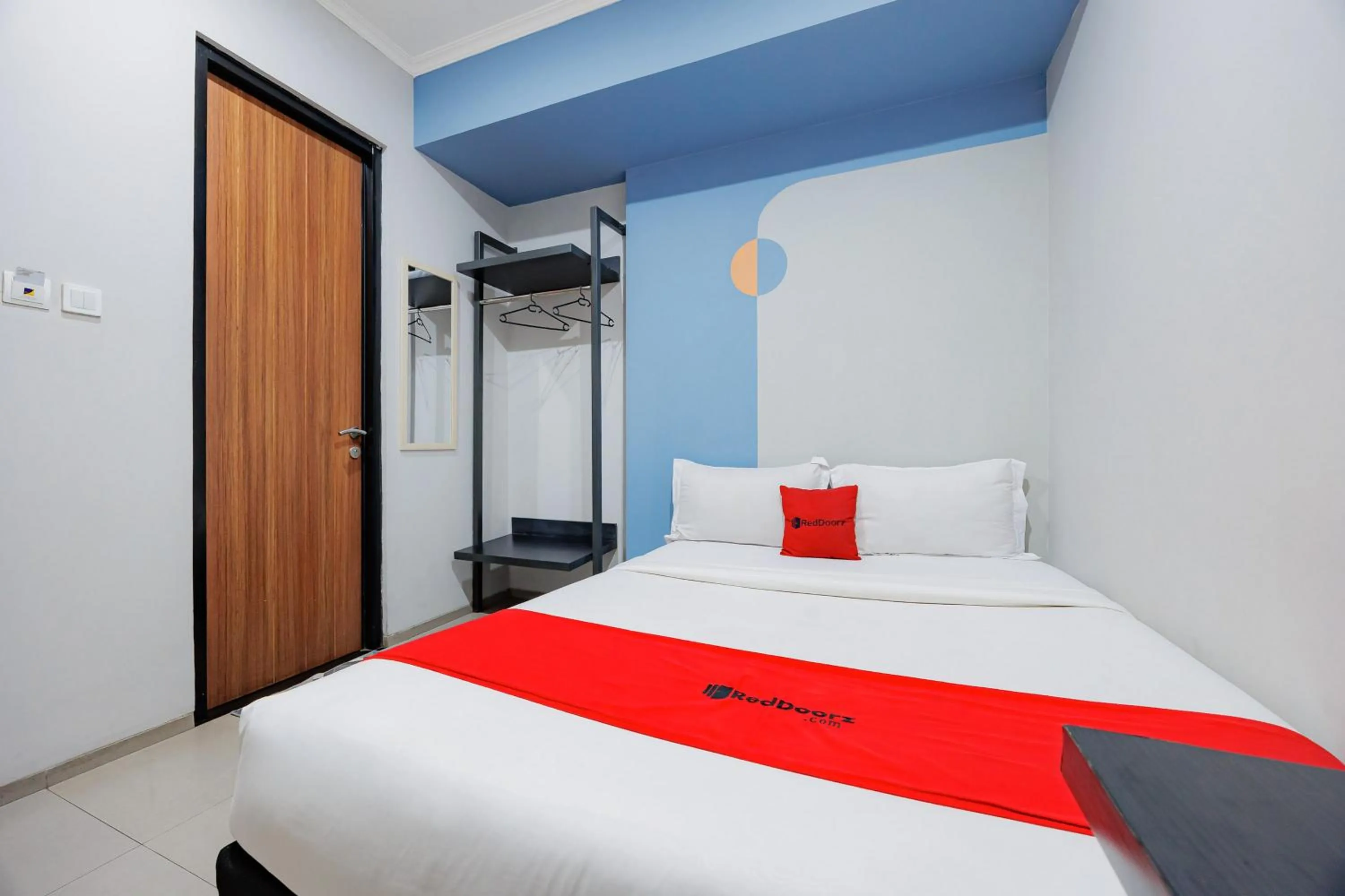 Bed in RedDoorz Plus near Radio Dalam 3