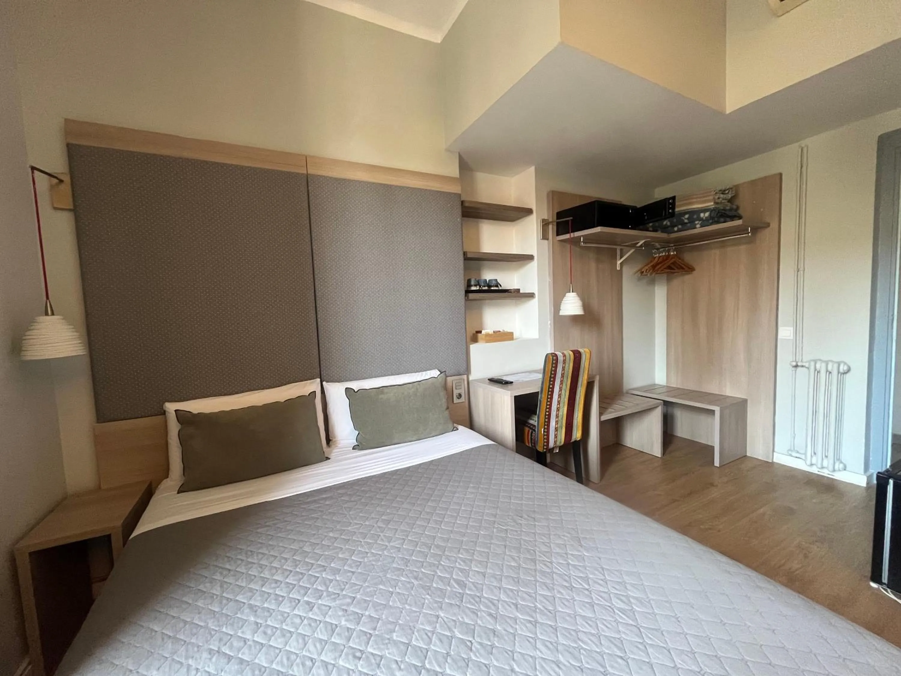 Bed in Hotel Ginebra