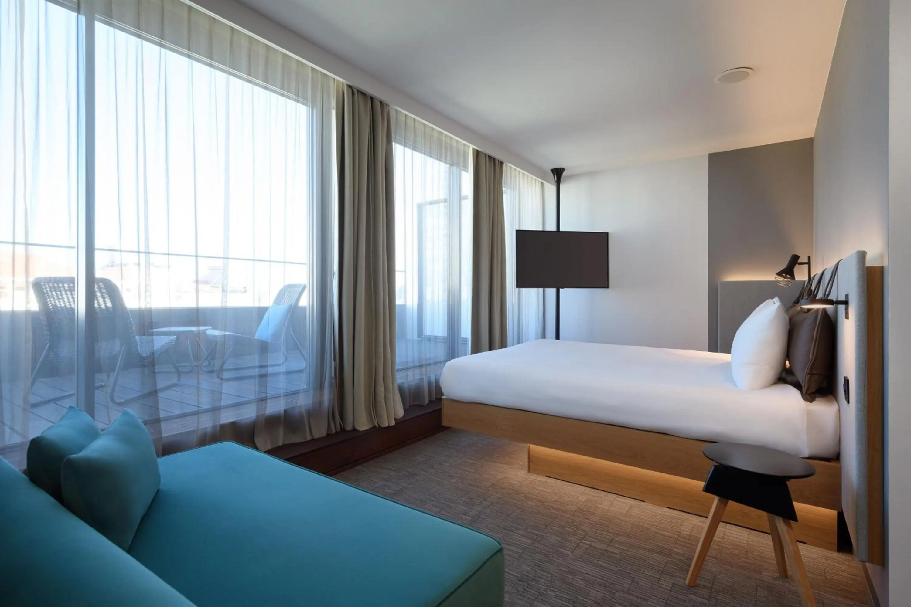 Photo of the whole room, Bed in Moxy Lisbon City