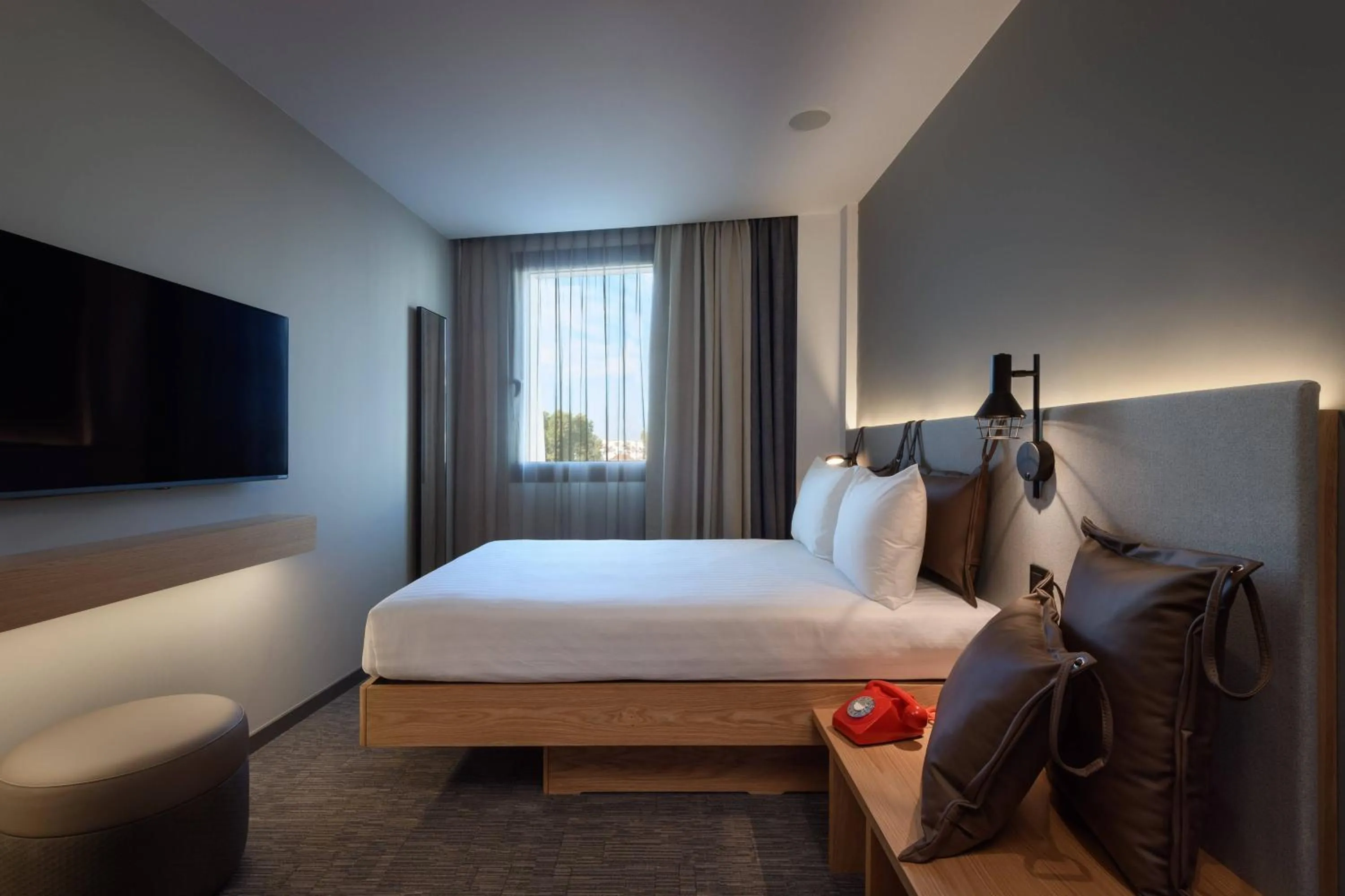 Photo of the whole room, Bed in Moxy Lisbon City