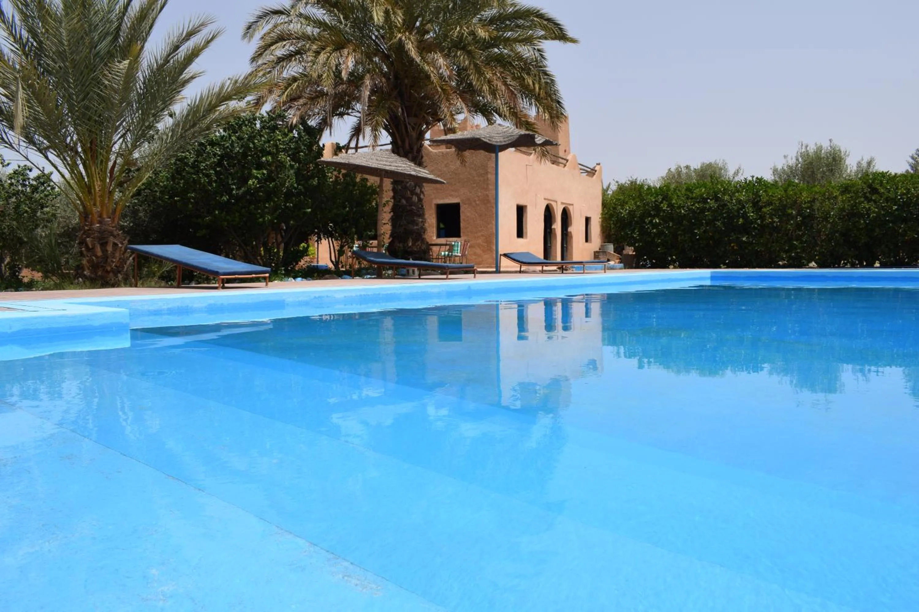 Swimming pool in Maison d'hotes la tour de toile