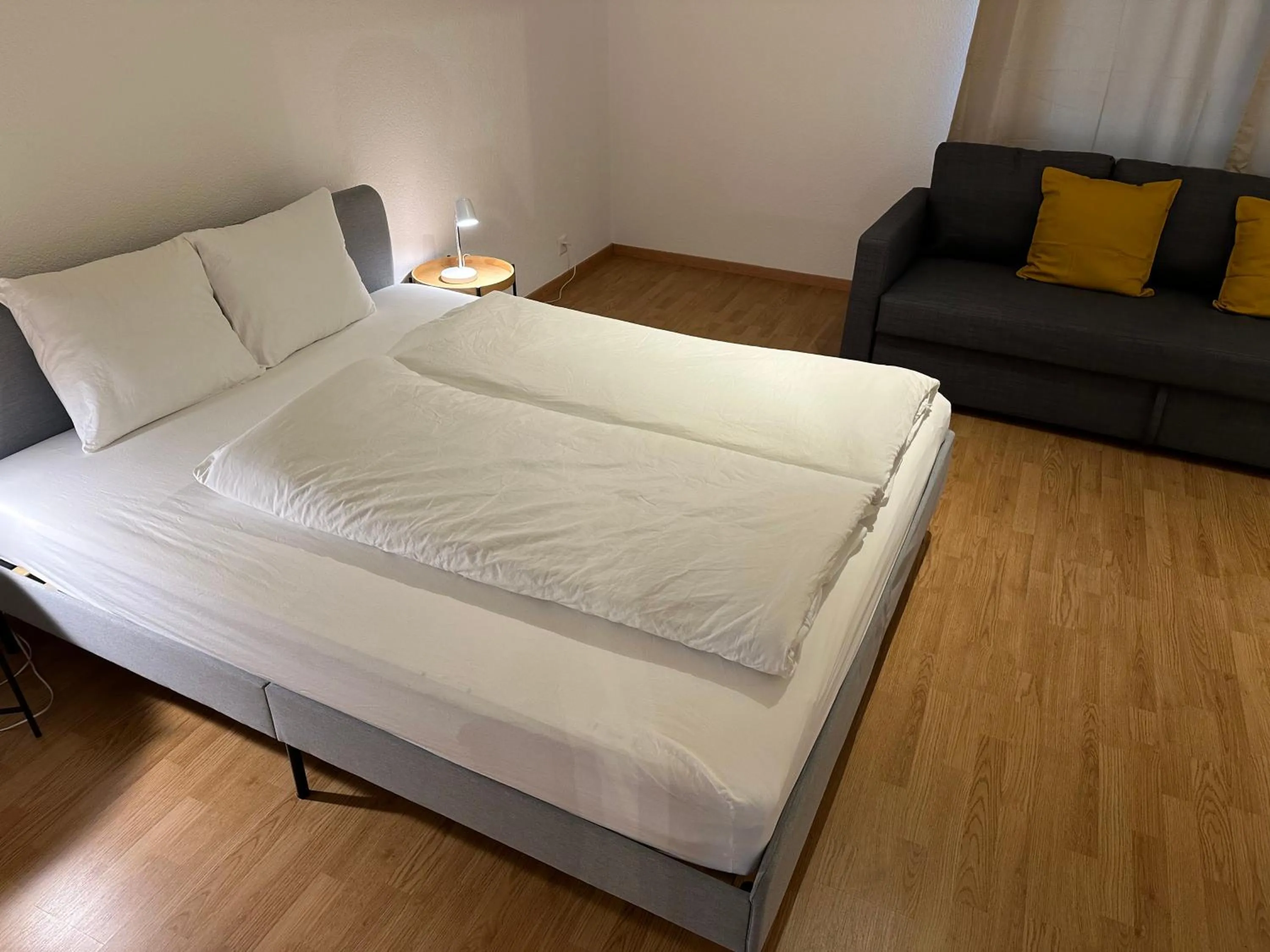 Bed in Galaxy Apartments Lucerne